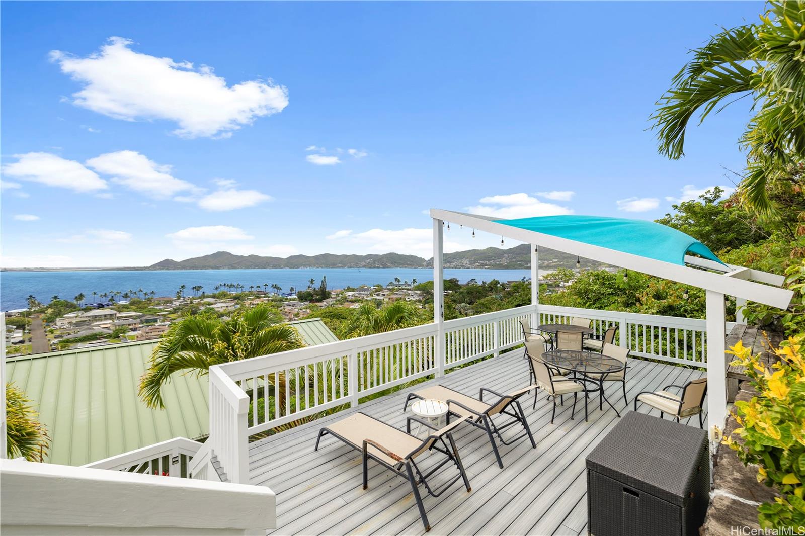 45-081 Lilipuna Road, Unit G Kaneohe, HI 96744 - Photo 18 of 25 a view of a chair and tables in the balcony