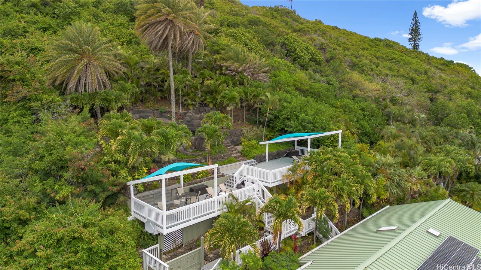 45-081 Lilipuna Road, Unit G Kaneohe, HI 96744 - Photo 24 of 25 a view of a house with a yard