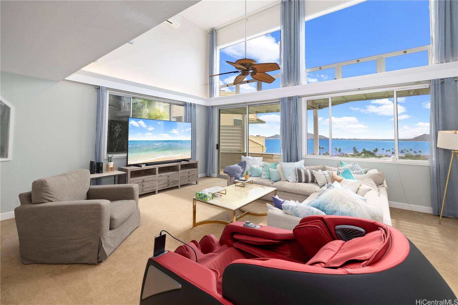 45-081 Lilipuna Road, Unit G Kaneohe, HI 96744 - Photo 3 of 25 a living room with furniture and a large window