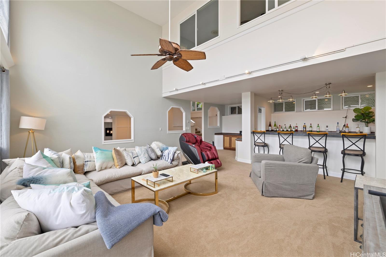 45-081 Lilipuna Road, Unit G Kaneohe, HI 96744 - Photo 4 of 25 a living room with furniture and a ceiling fan