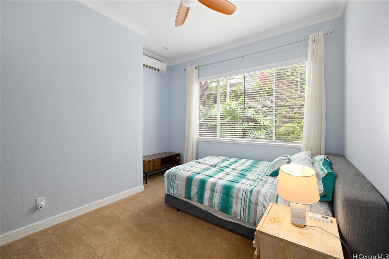 45-081 Lilipuna Road, Unit G Kaneohe, HI 96744 - Photo 10 of 25 a bedroom with a bed and window