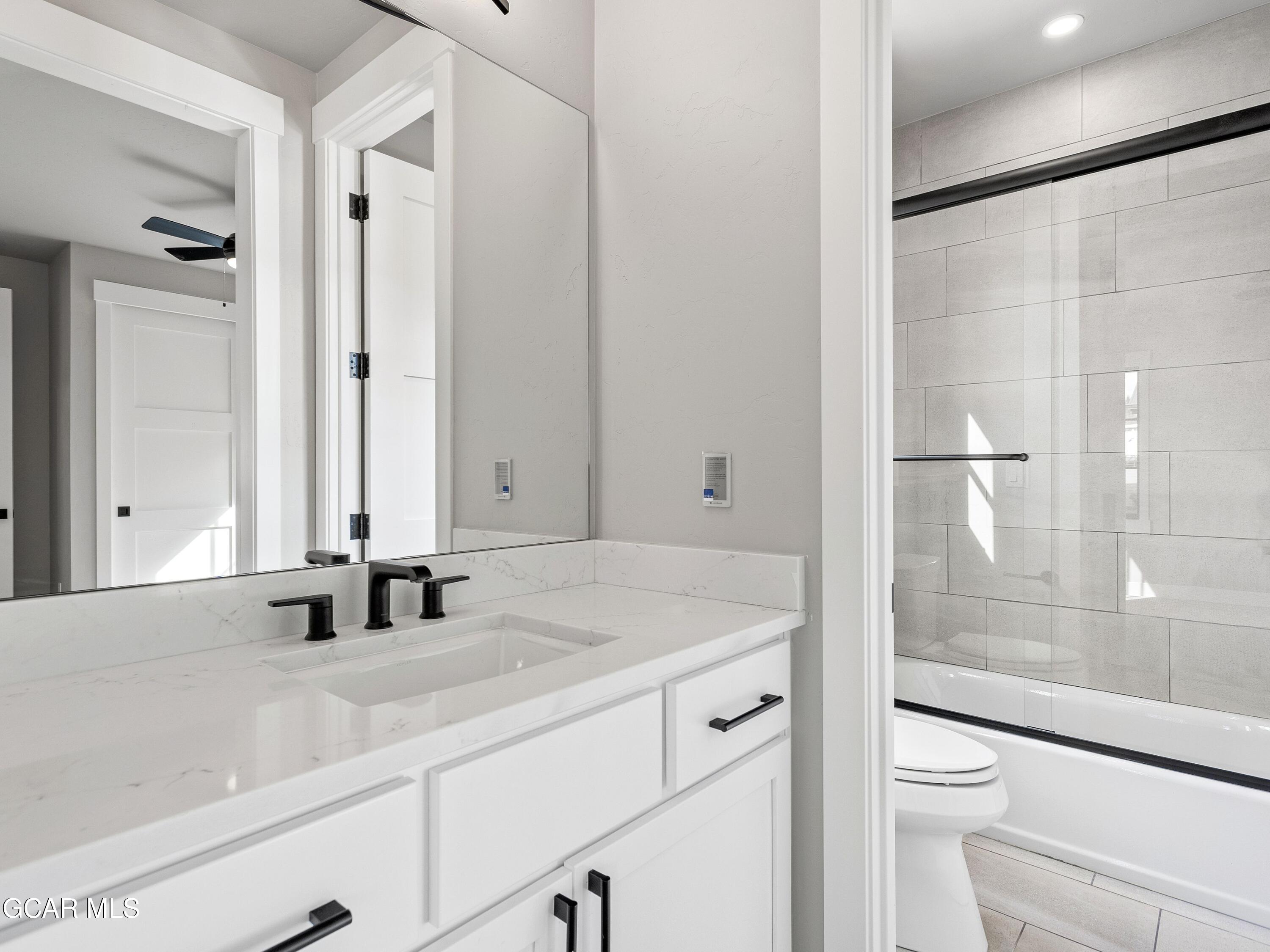 12 Exploration Trail Winter Park, CO 80482 - Photo 27 of 52 a bathroom with a sink and a mirror