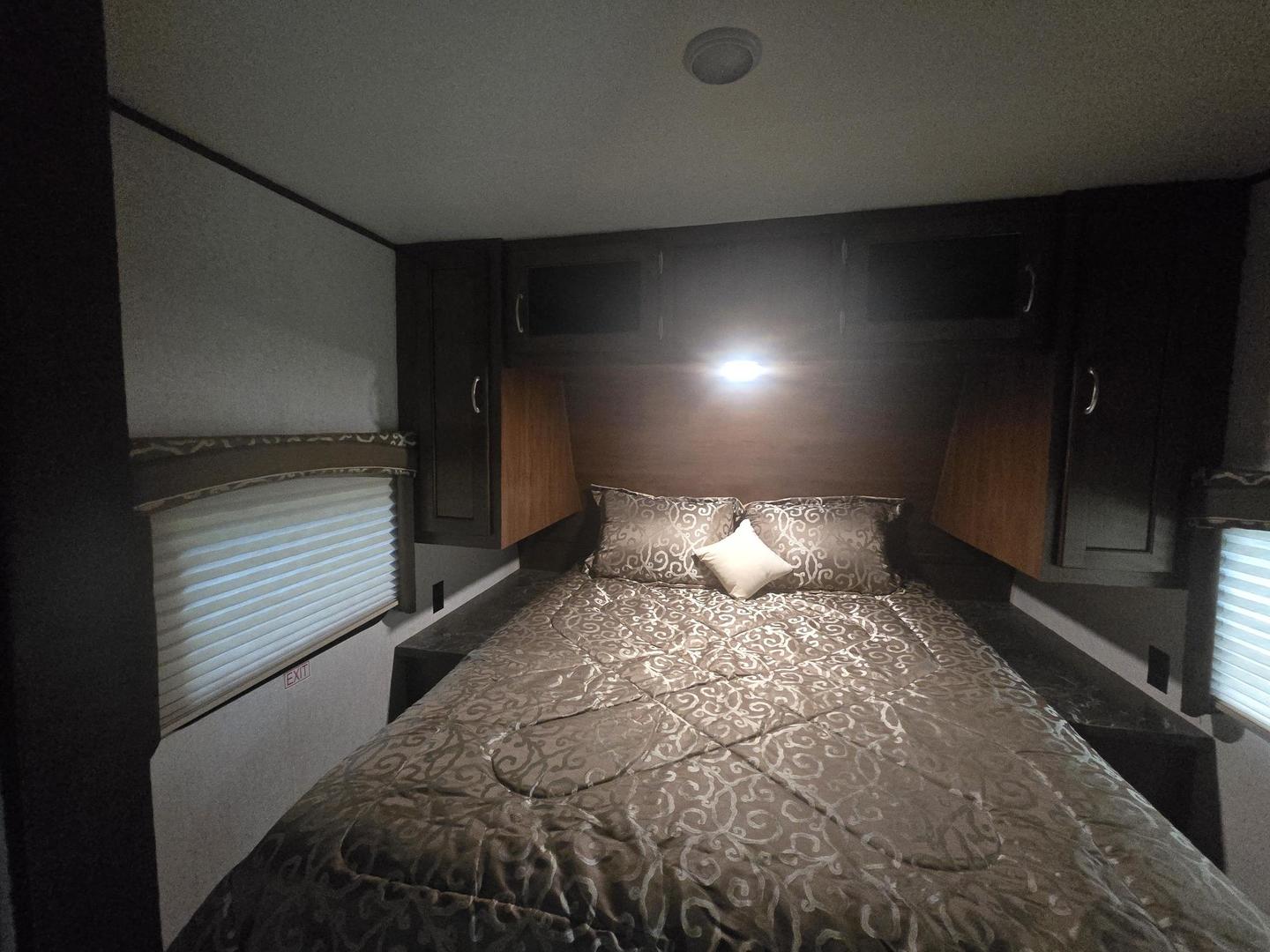 5-343 & 344 Woodhaven Sublette, IL 61367 - Photo 14 of 27 a large bed sitting in a room next to a lamp