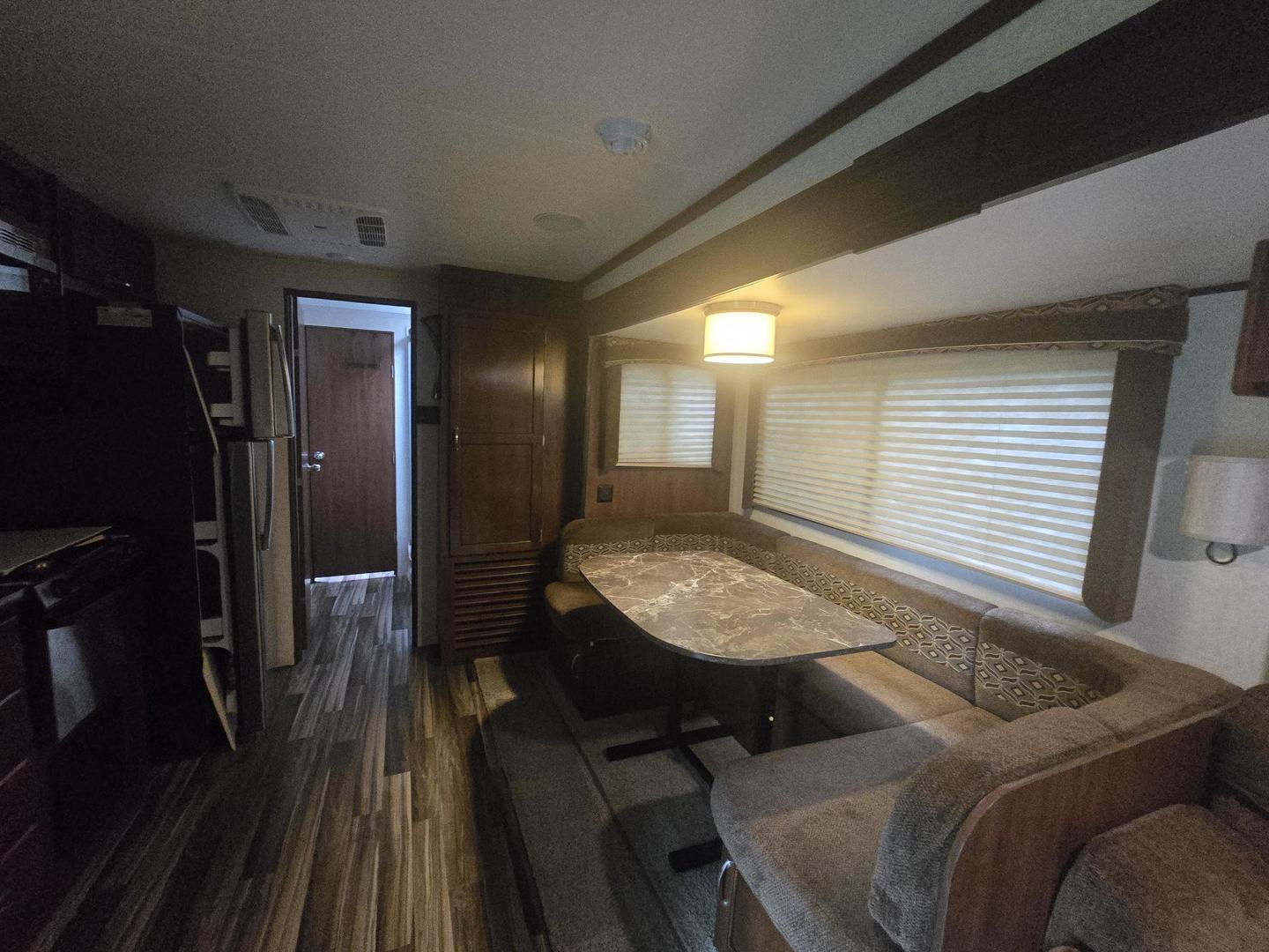 5-343 & 344 Woodhaven Sublette, IL 61367 - Photo 17 of 27 a living room with furniture and a wooden floor