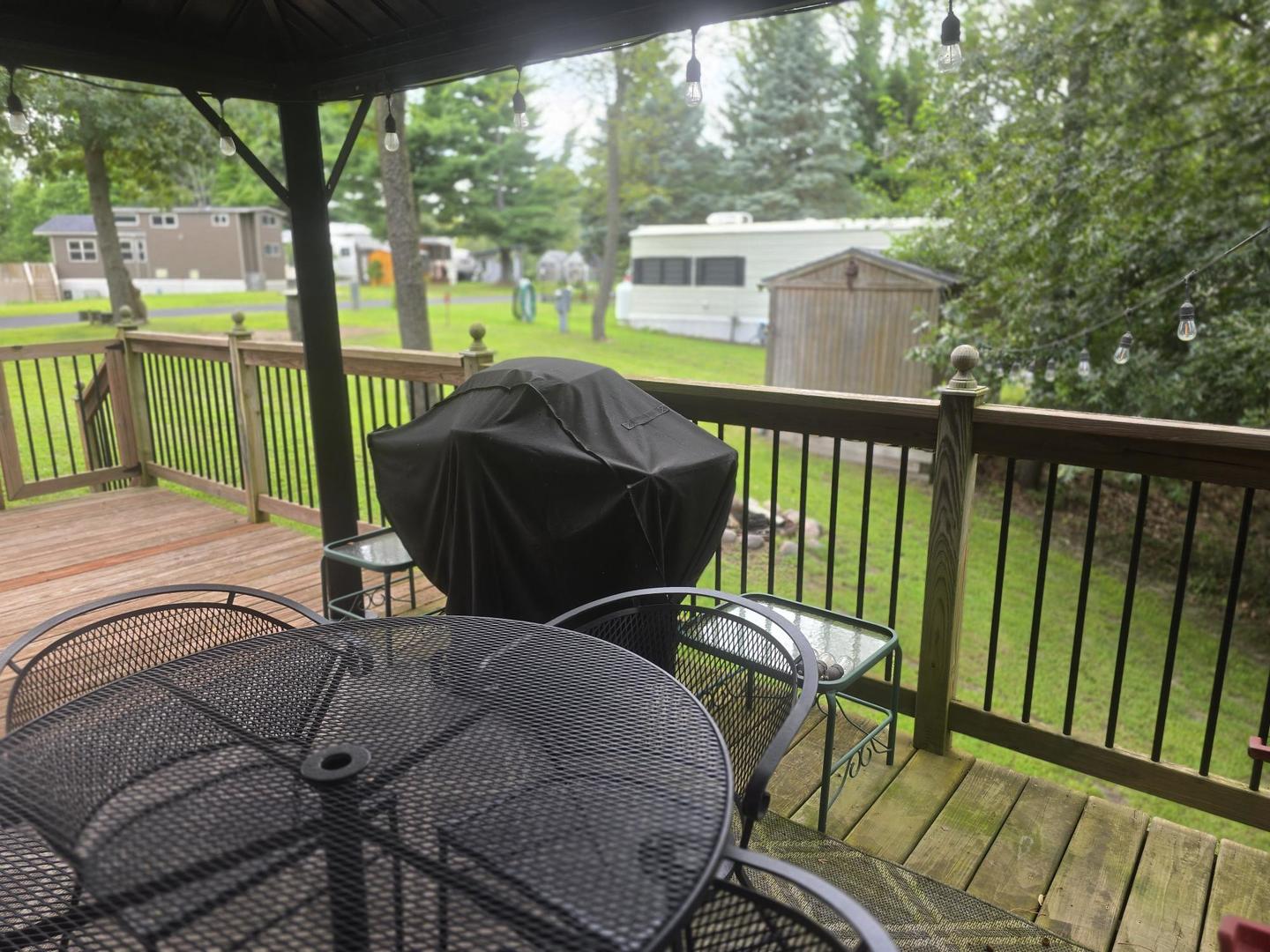 5-343 & 344 Woodhaven Sublette, IL 61367 - Photo 3 of 27 a view of a chairs and table in the balcony