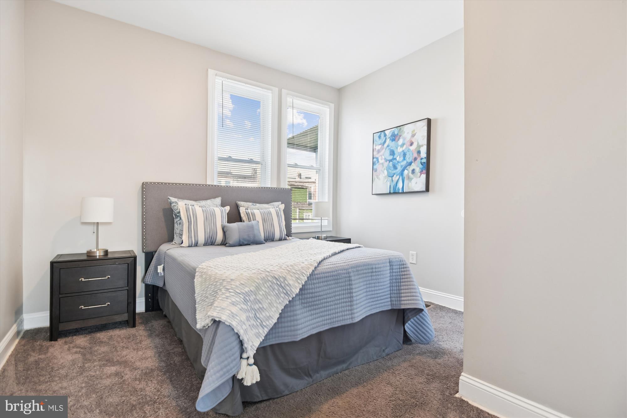 730 Edgewood Street Baltimore, MD 21229 - Photo 11 of 21 a bedroom with a bed and dresser