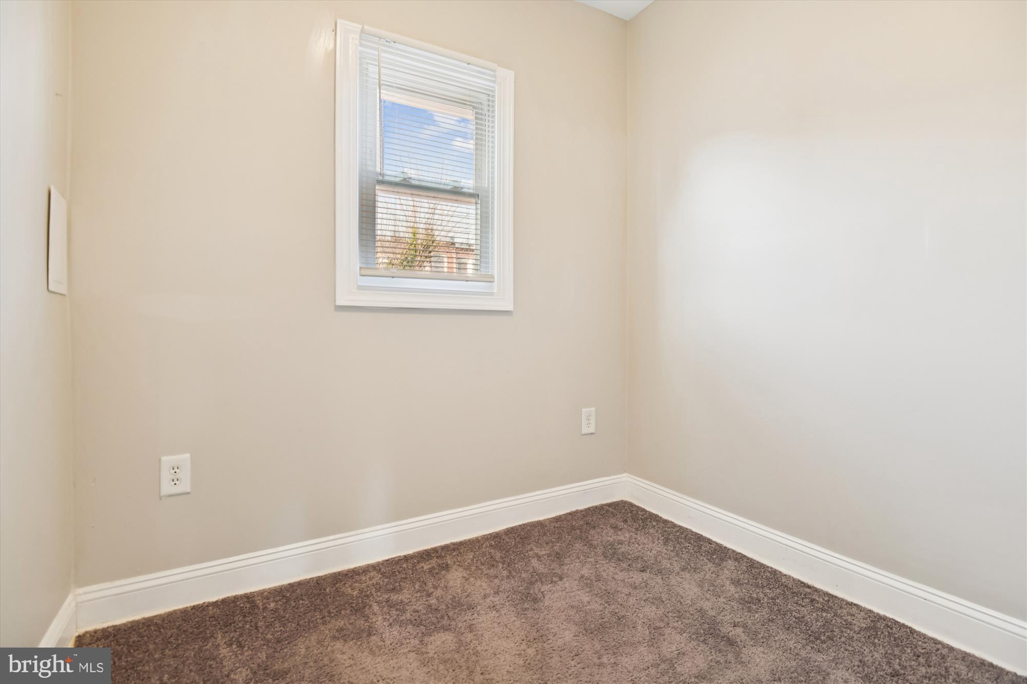 730 Edgewood Street Baltimore, MD 21229 - Photo 15 of 21 an empty room with a window
