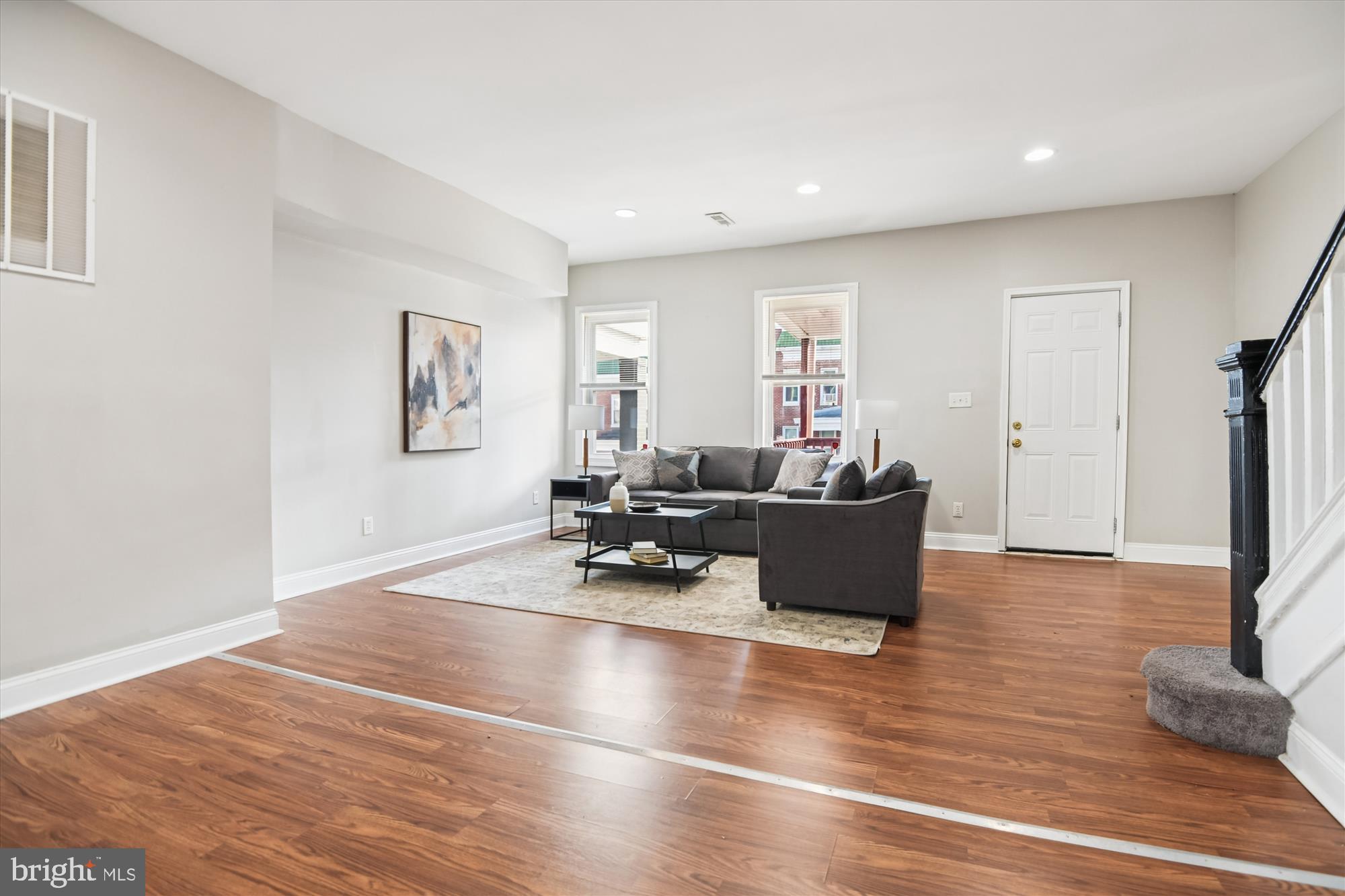 730 Edgewood Street Baltimore, MD 21229 - Photo 5 of 21 a living room with furniture and a flat screen tv