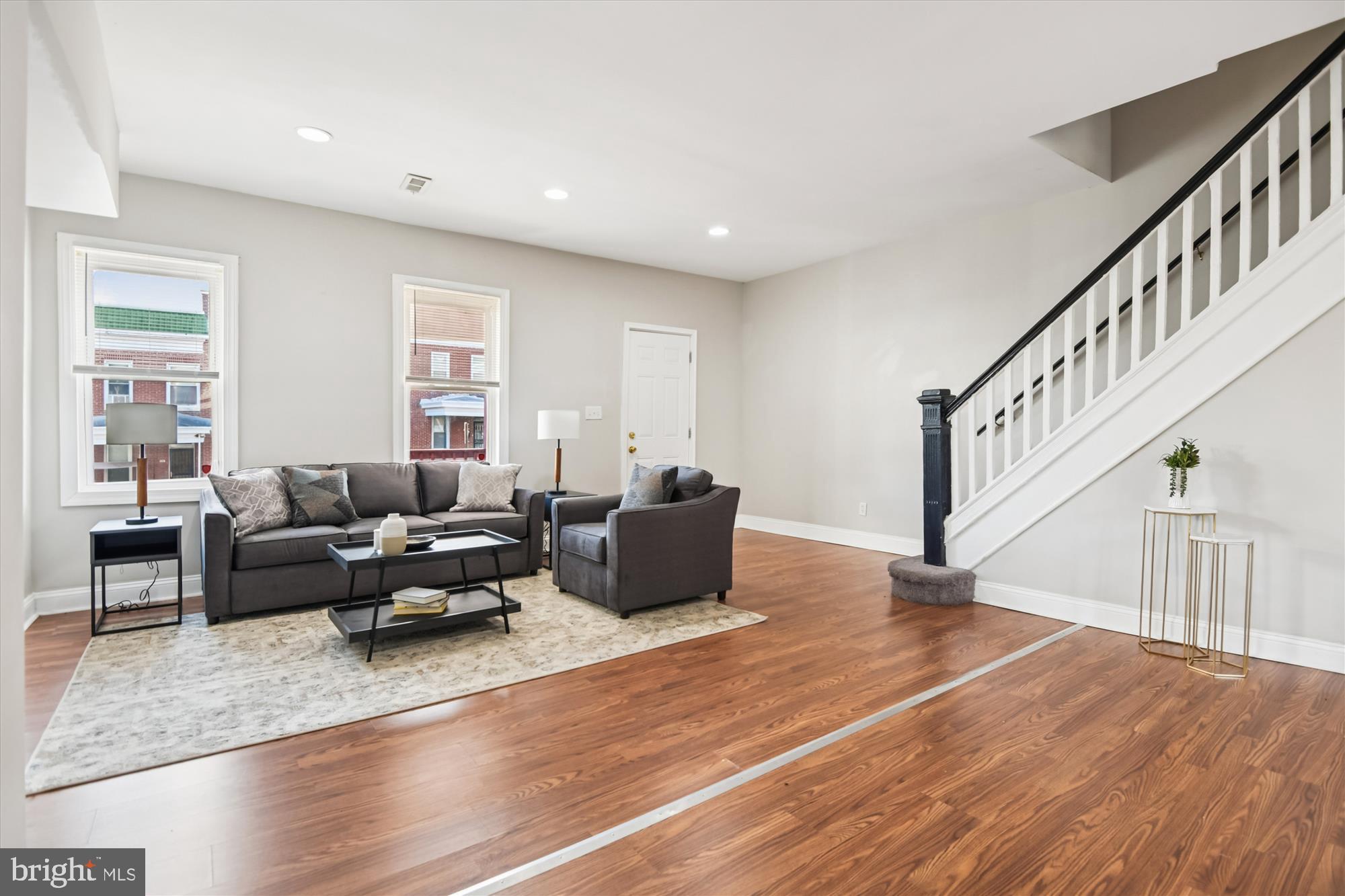 730 Edgewood Street Baltimore, MD 21229 - Photo 6 of 21 a living room with furniture and a wooden floor
