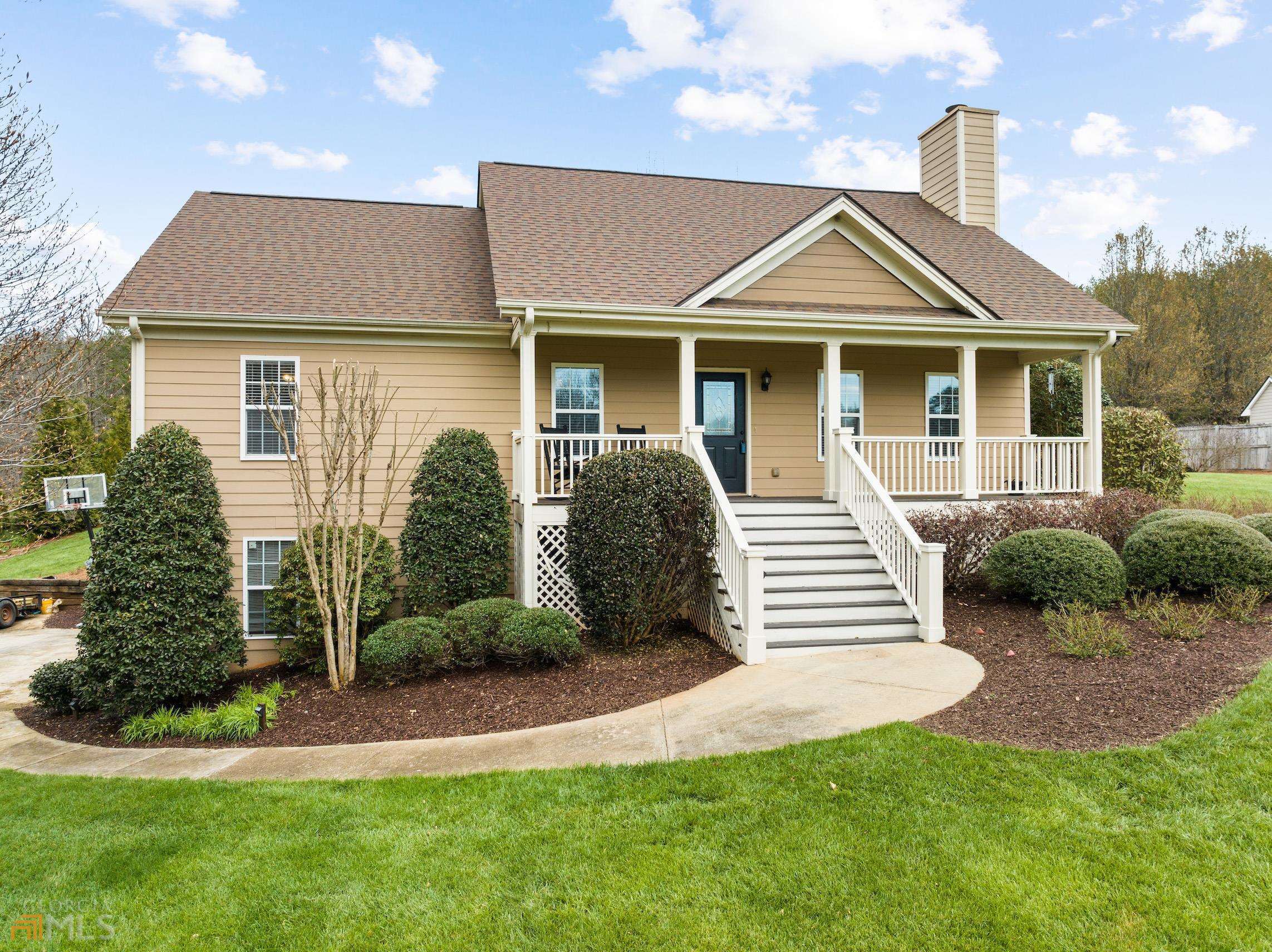 122 Stonebrook Trail Cleveland, GA 30528 - Photo 1 of 1 a front view of a house with a yard