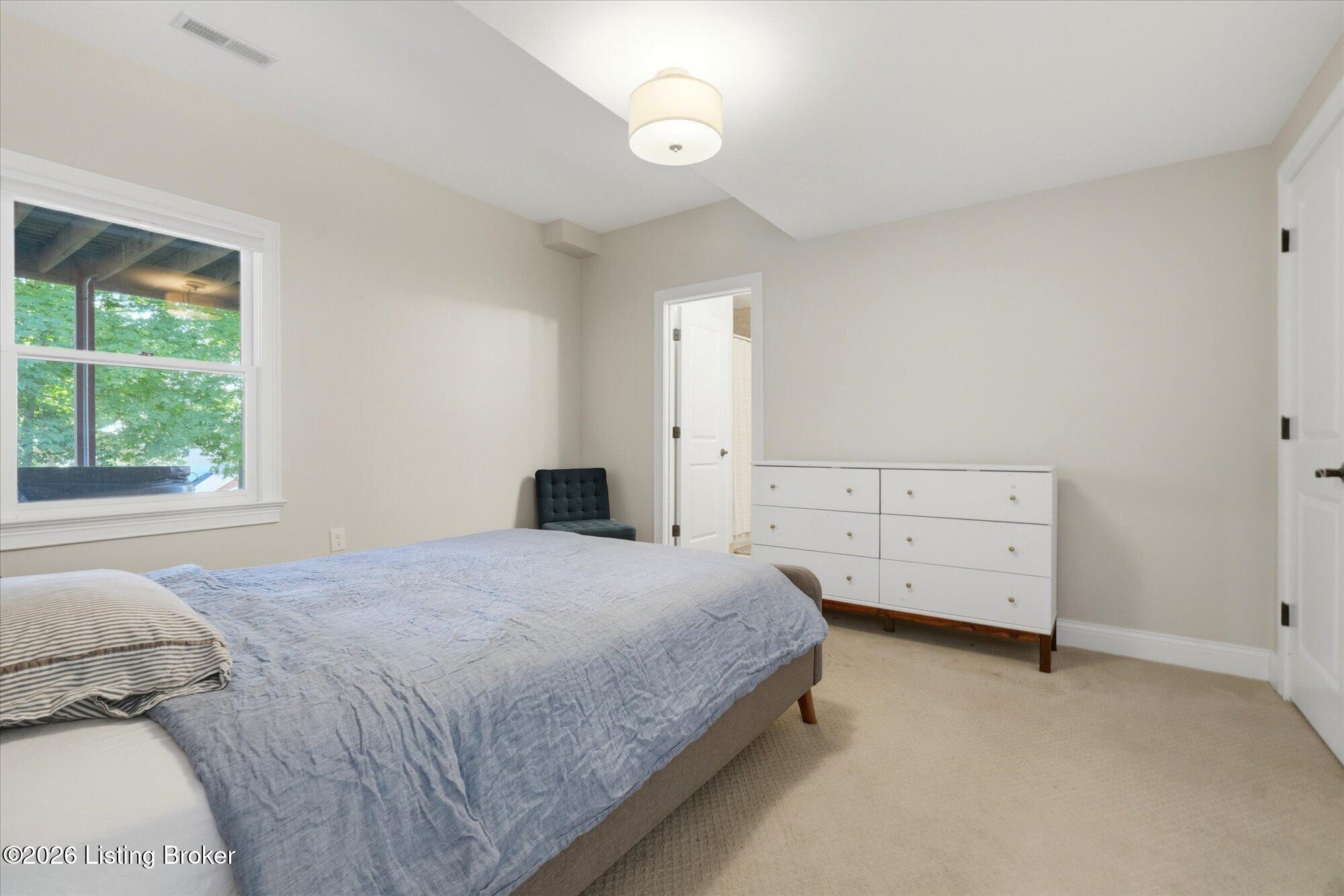 5722 Moser Farm Road Prospect, KY 40059 - Photo 50 of 65 The basement bedroom offers a comfortable and private space, ideal for a guest space or more.