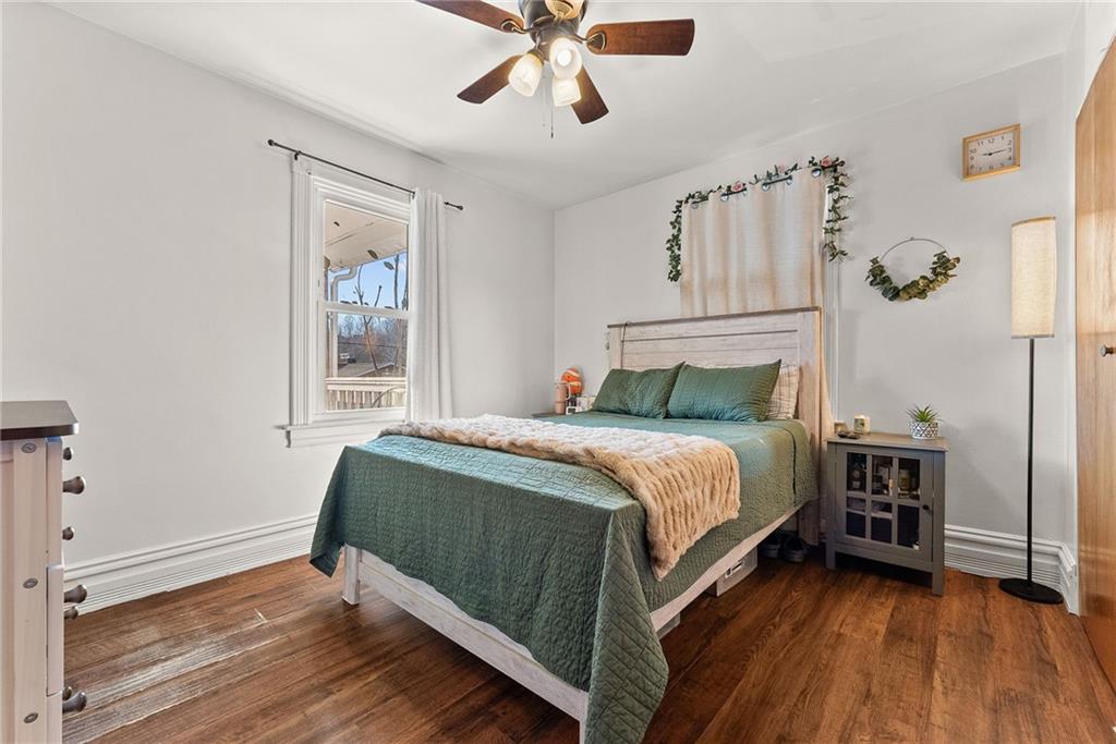 1906 Cliff Street Coraopolis, PA 15108 - Photo 17 of 39 a bedroom with a bed and a window