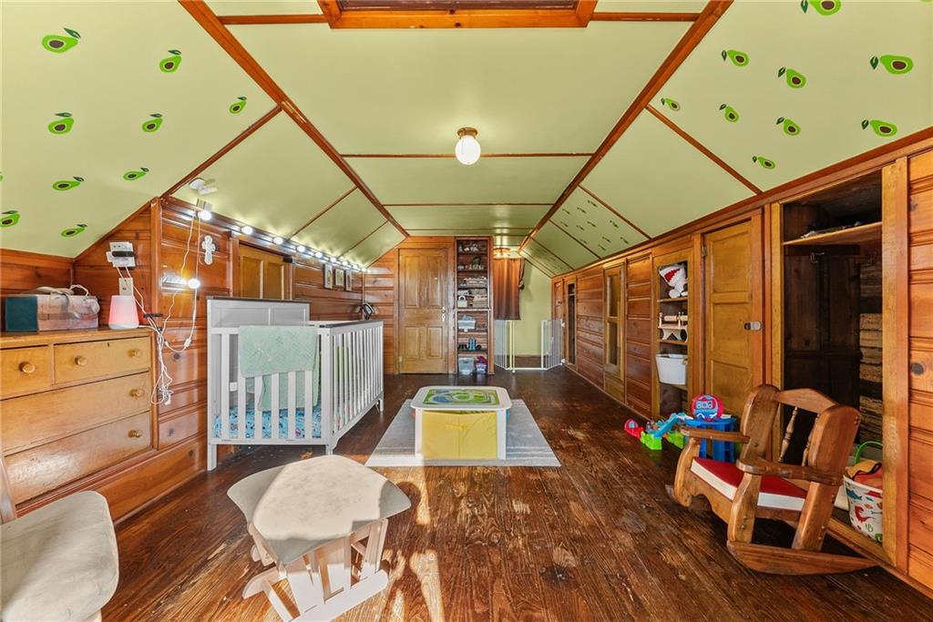 1906 Cliff Street Coraopolis, PA 15108 - Photo 24 of 39 a room with wooden furniture and large windows