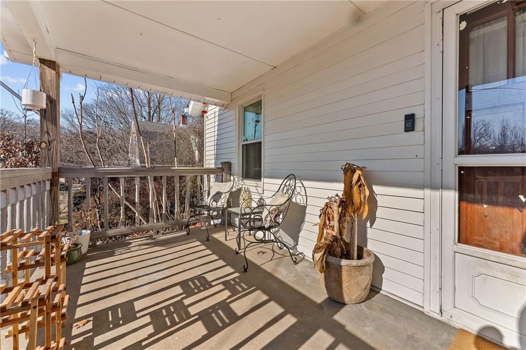 1906 Cliff Street Coraopolis, PA 15108 - Photo 3 of 39 a view of two chairs and table in the balcony
