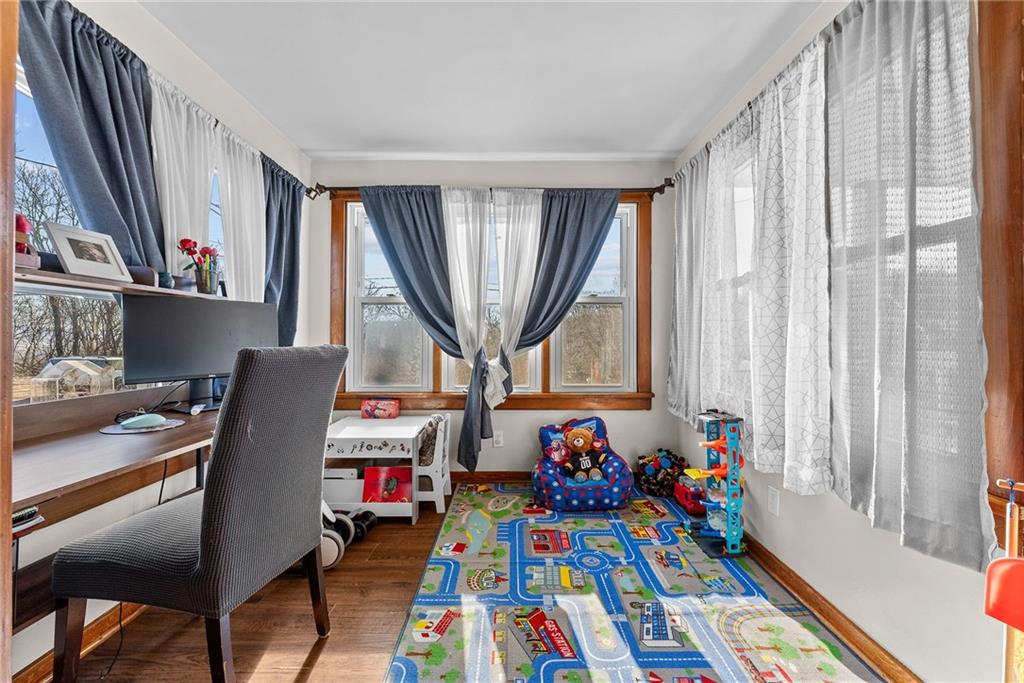 1906 Cliff Street Coraopolis, PA 15108 - Photo 8 of 39 a room with furniture and a window