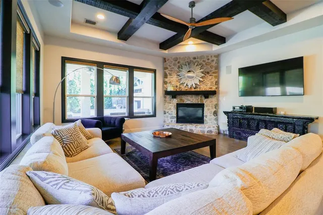 a bathroom with a bathtub and double sink