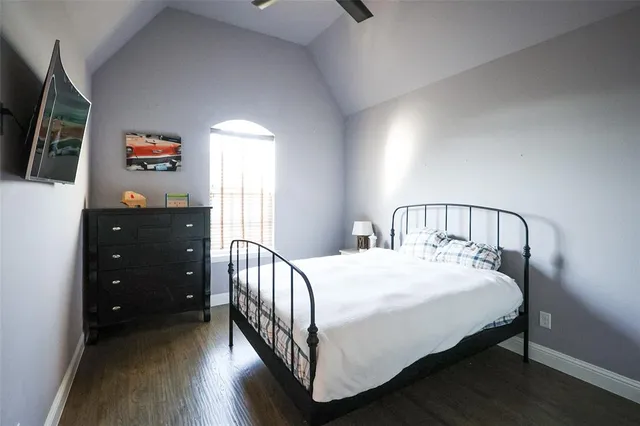 a kitchen with stainless steel appliances granite countertop a table chairs sink and cabinets