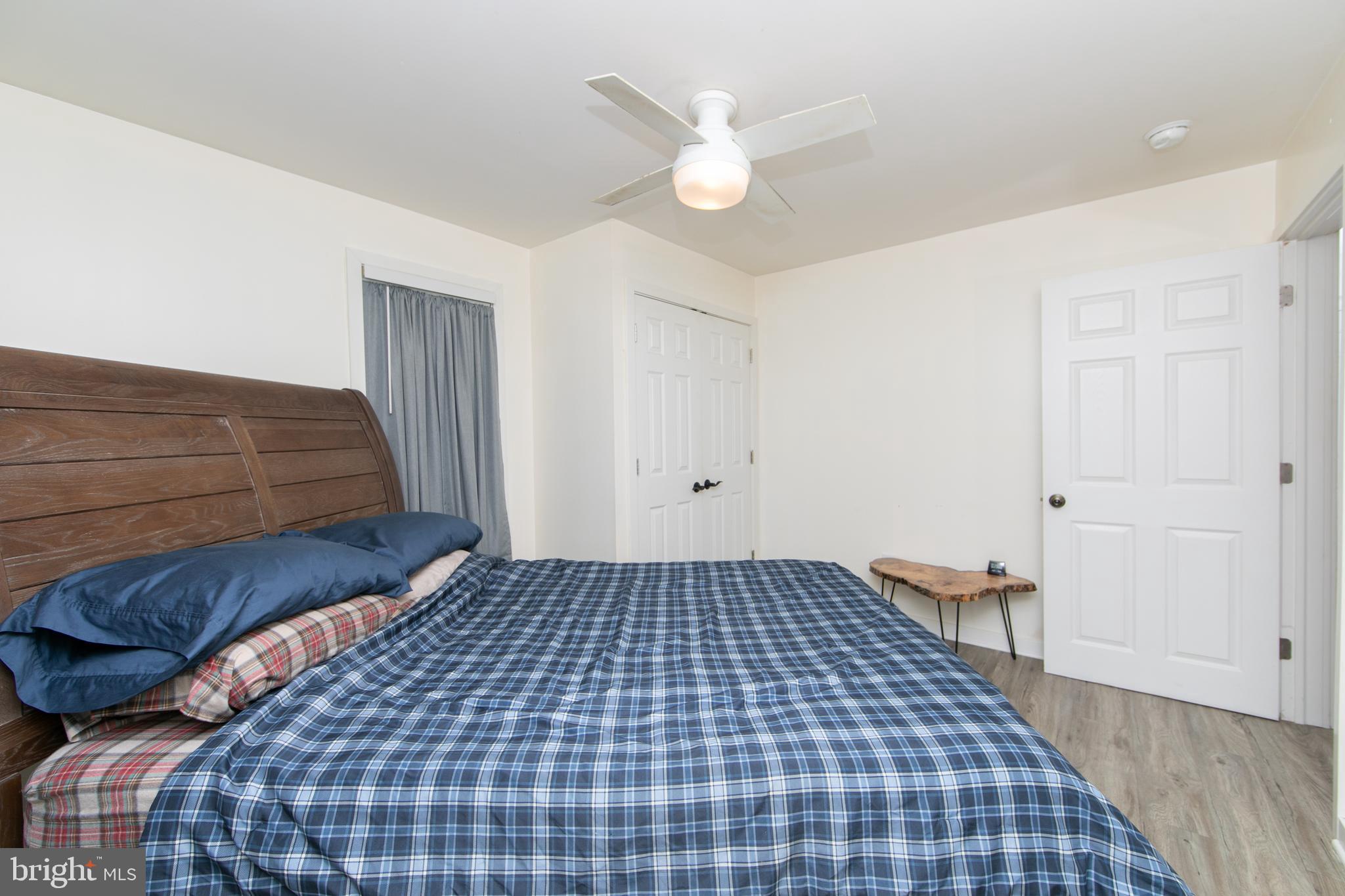 38 Lincoln Avenue Clementon, NJ 08021 - Photo 11 of 38 a bedroom with a bed and a window