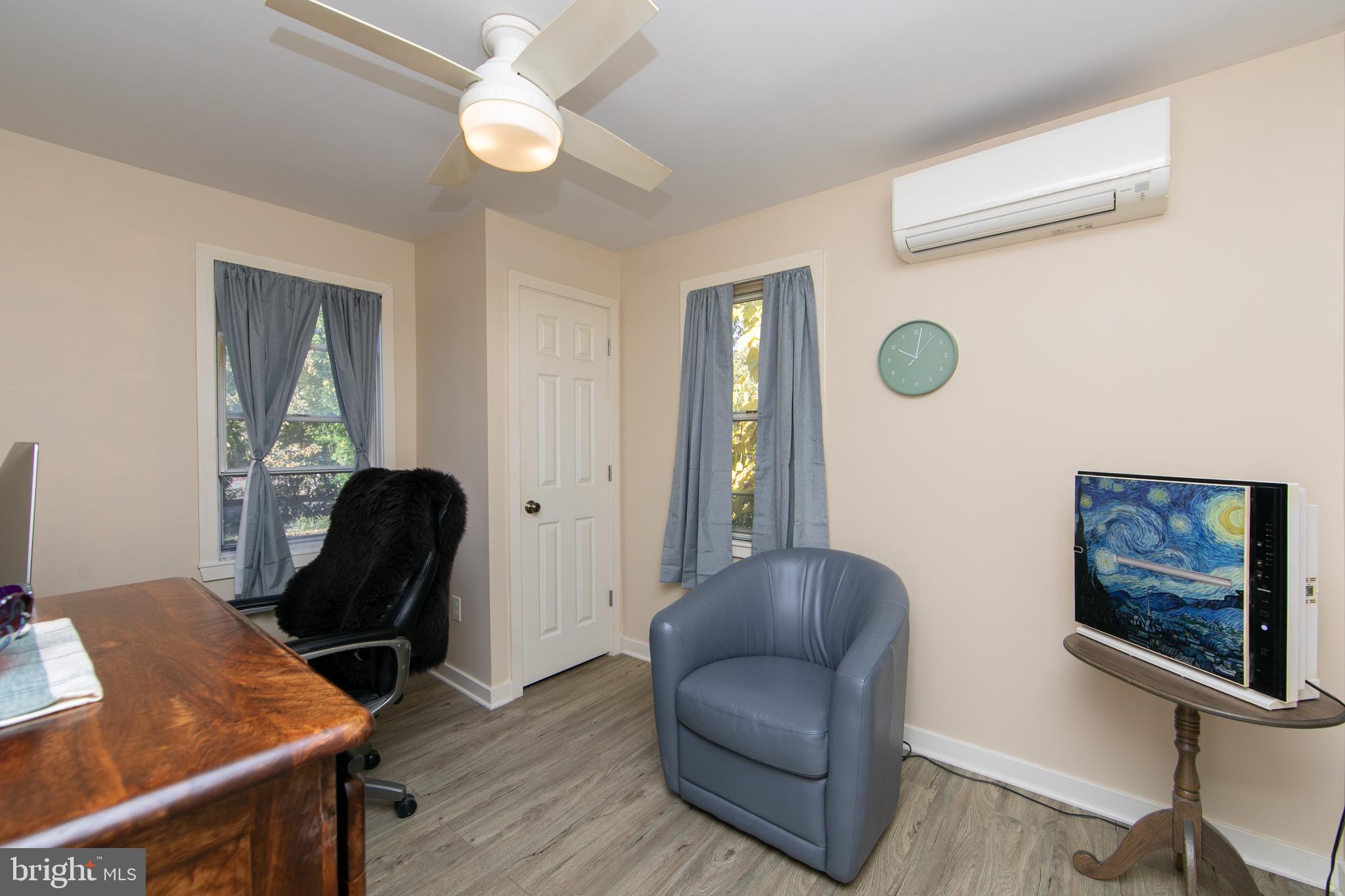 38 Lincoln Avenue Clementon, NJ 08021 - Photo 12 of 38 a living room with furniture and a chair
