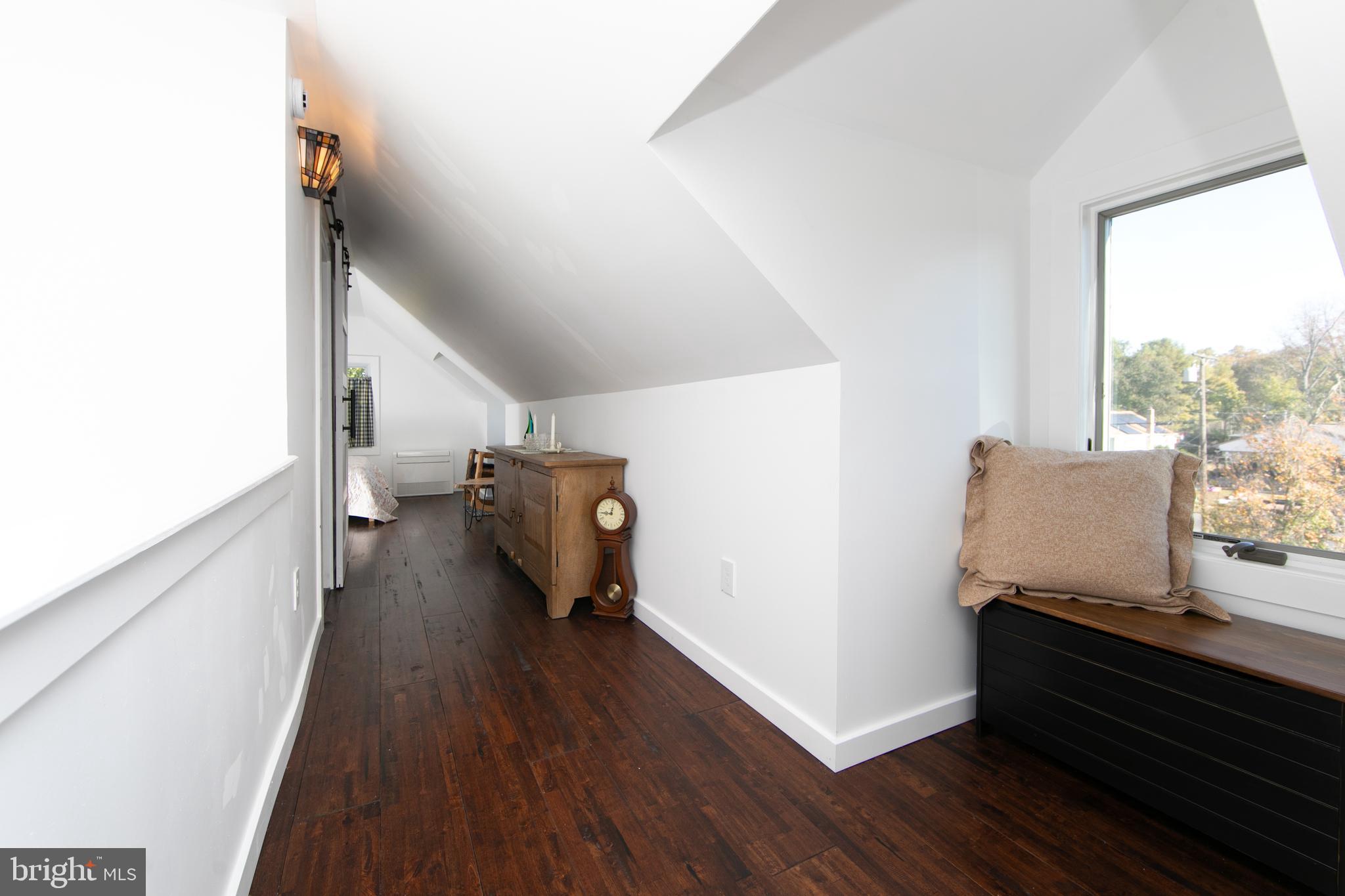 38 Lincoln Avenue Clementon, NJ 08021 - Photo 15 of 38 a living room with furniture and a wooden floor