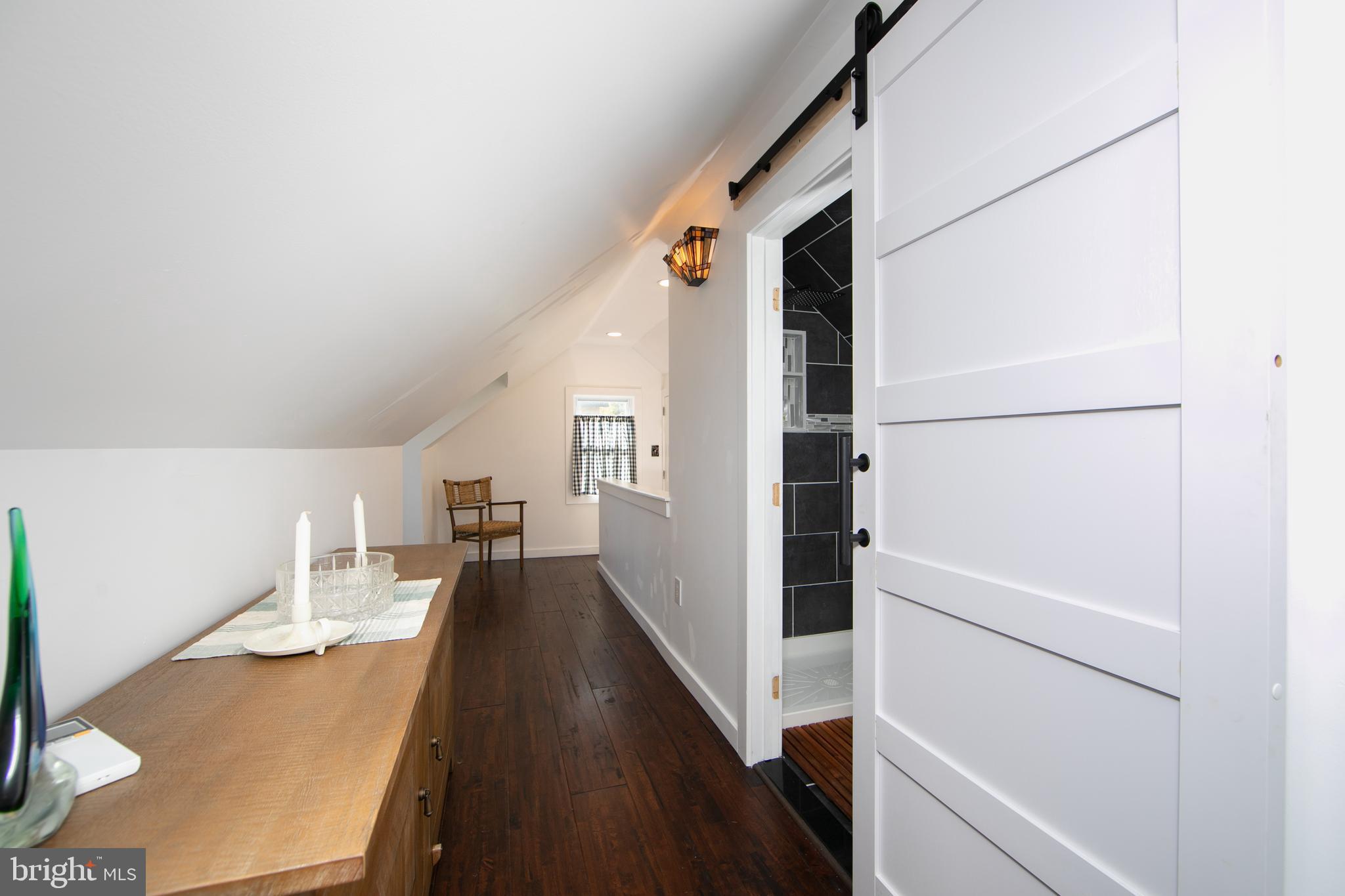 38 Lincoln Avenue Clementon, NJ 08021 - Photo 19 of 38 a view of a hallway with wooden floor and staircase