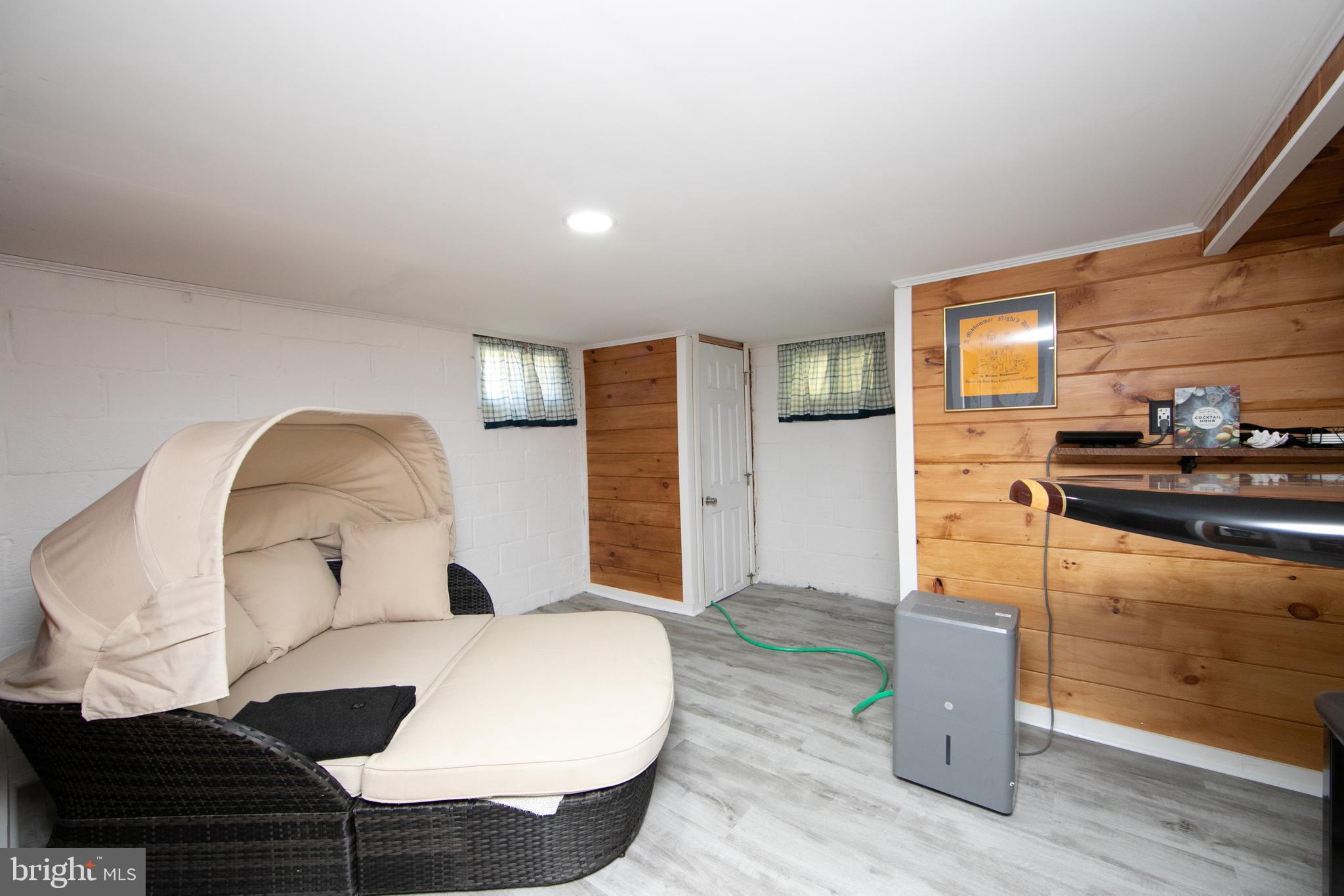 38 Lincoln Avenue Clementon, NJ 08021 - Photo 25 of 38 a living room with furniture and a wooden floor