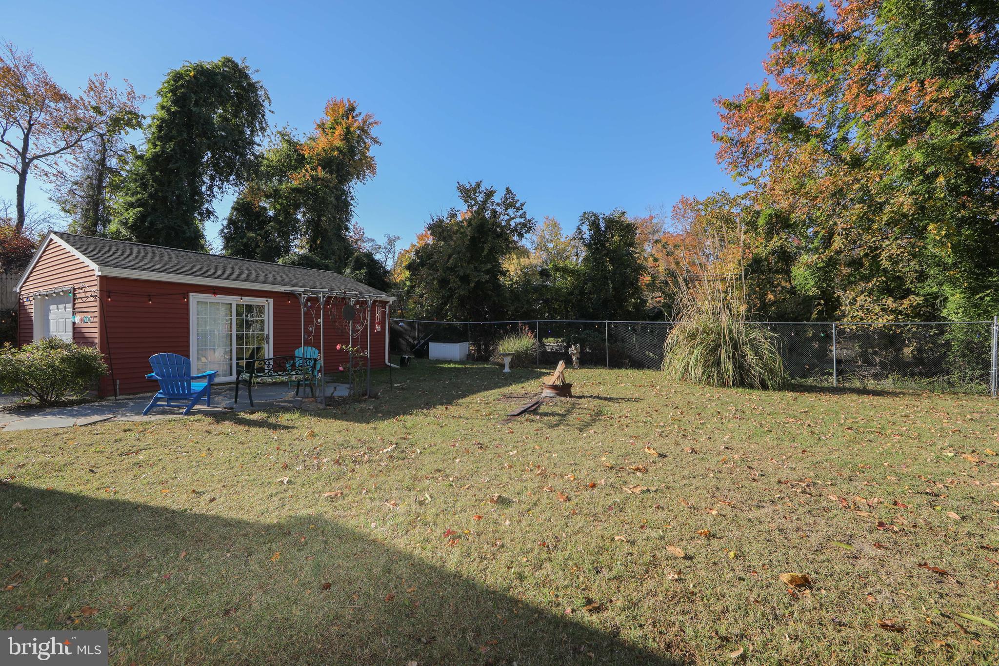 38 Lincoln Avenue Clementon, NJ 08021 - Photo 33 of 38 a view of a house with a yard and sitting area