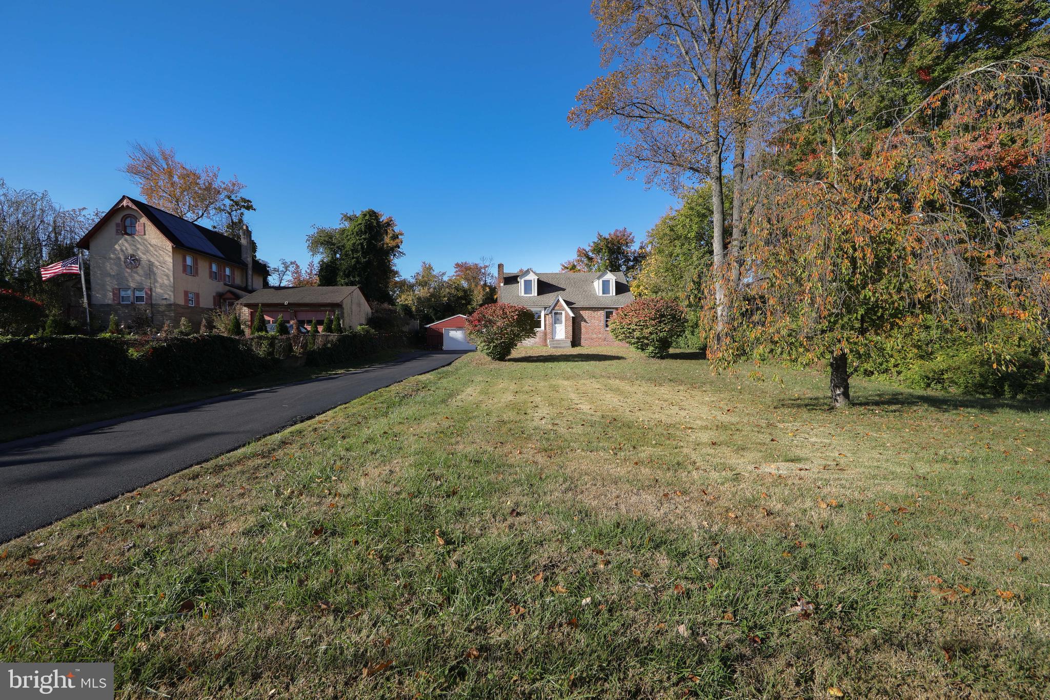 38 Lincoln Avenue Clementon, NJ 08021 - Photo 36 of 38 a view of a yard with cars parked in front of it