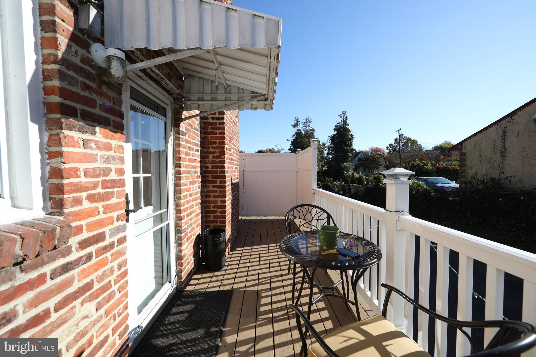 38 Lincoln Avenue Clementon, NJ 08021 - Photo 5 of 38 a view of balcony with wooden floor and outdoor seating