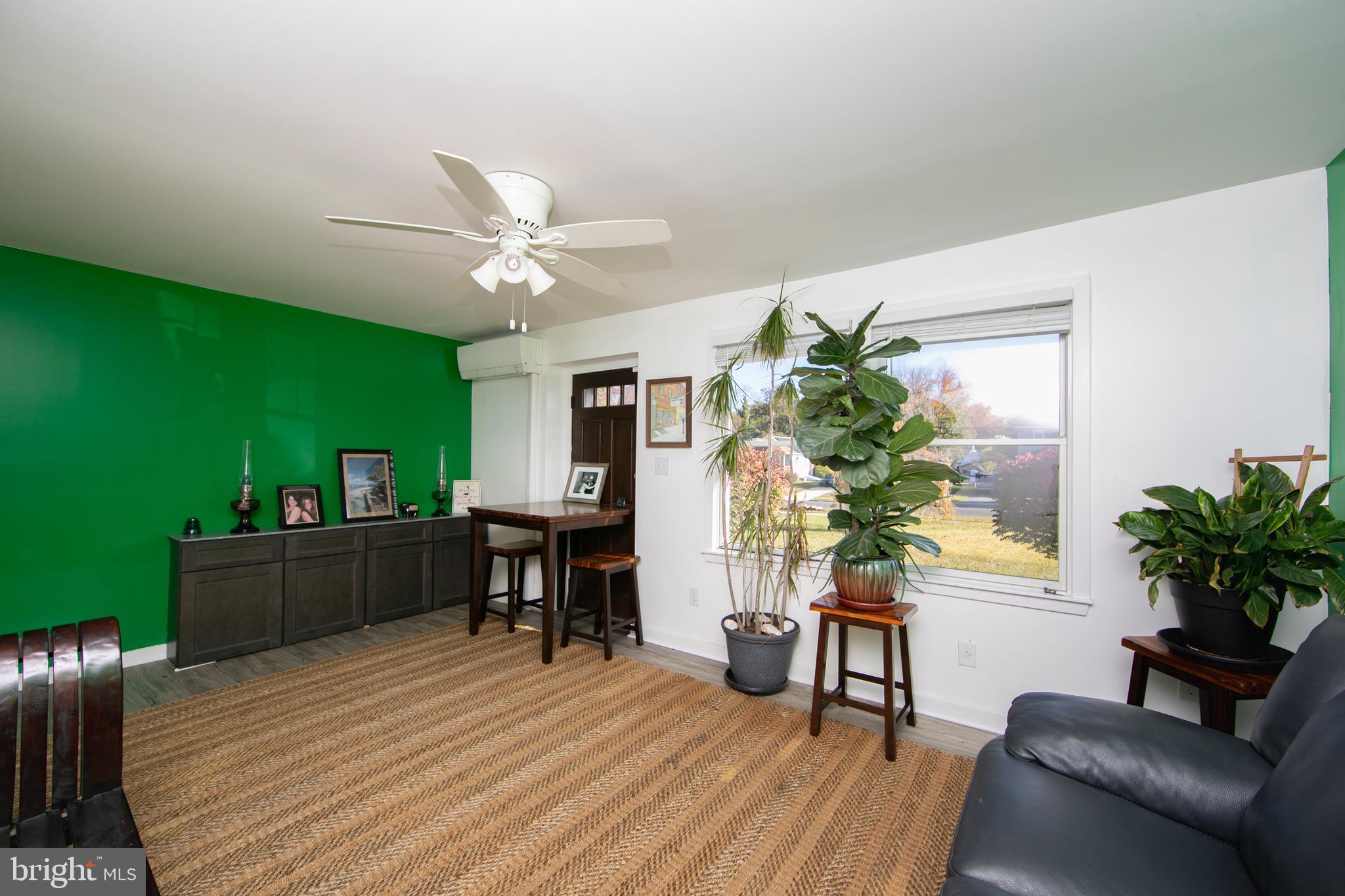 38 Lincoln Avenue Clementon, NJ 08021 - Photo 8 of 38 a living room with furniture and a wooden floor