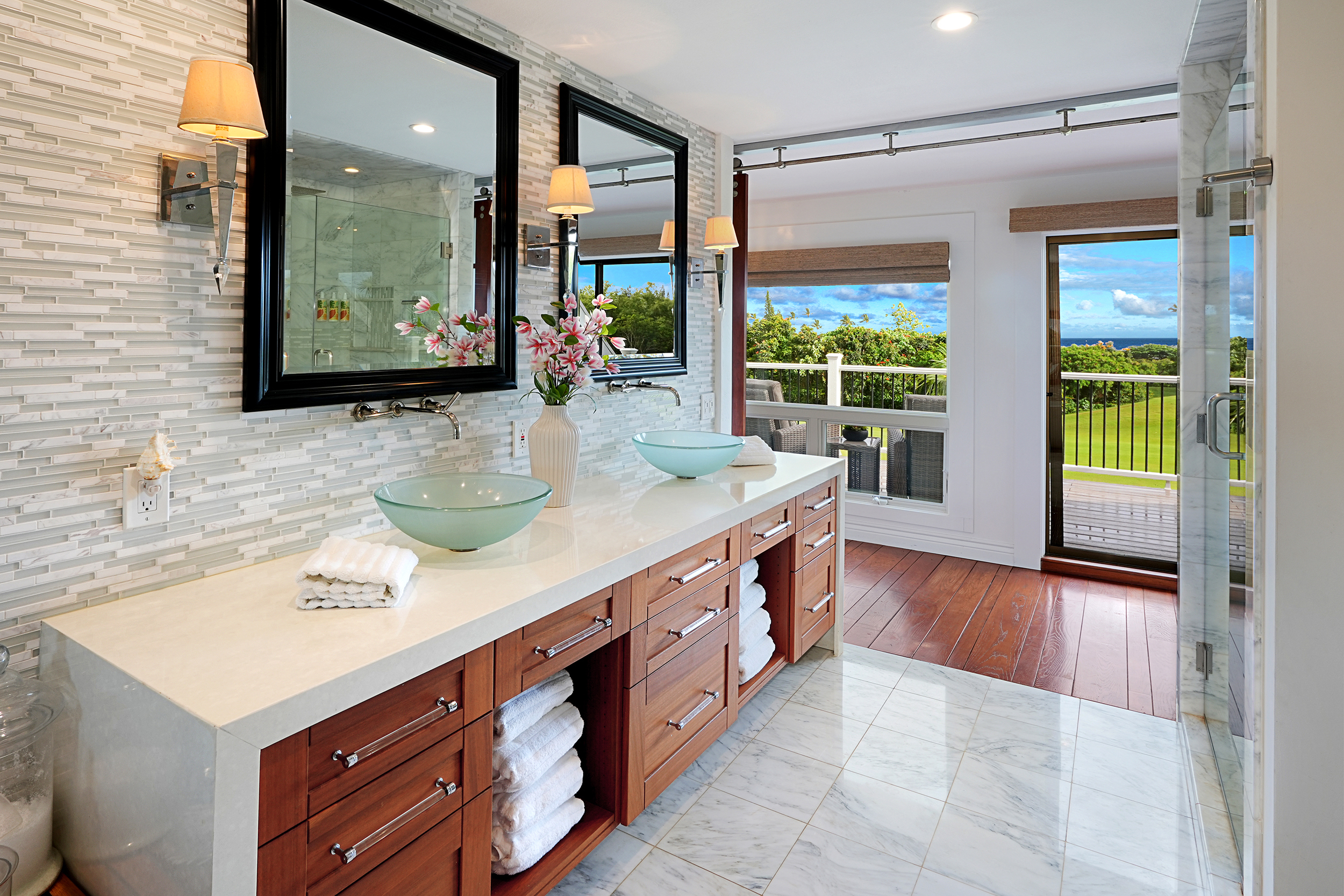 5348 Honoiki Road Princeville, HI 96722 - Photo 14 of 25 a kitchen with stainless steel appliances granite countertop a sink and a wooden floors