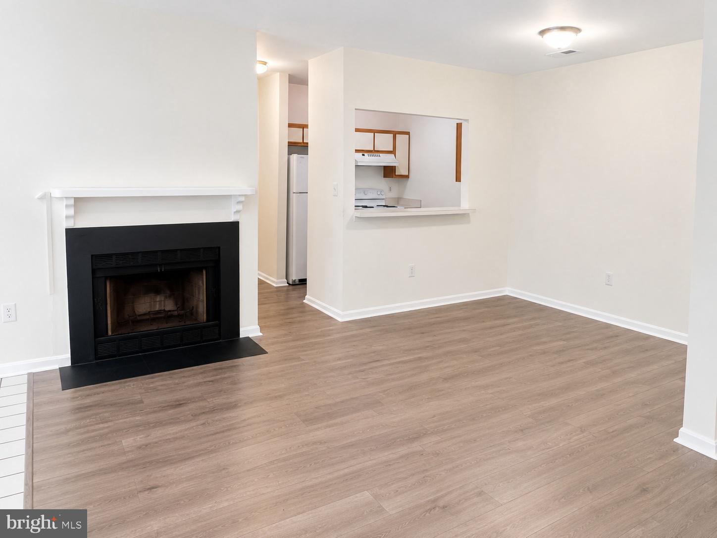 604 Moonglow Road, Unit 102 Odenton, MD 21113 - Photo 6 of 27 Inviting space with cozy fireplace charm.