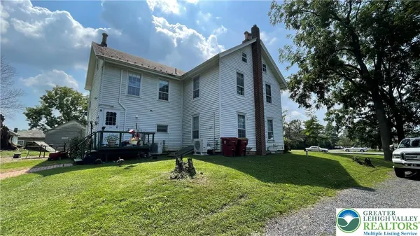 a house view with a garden space