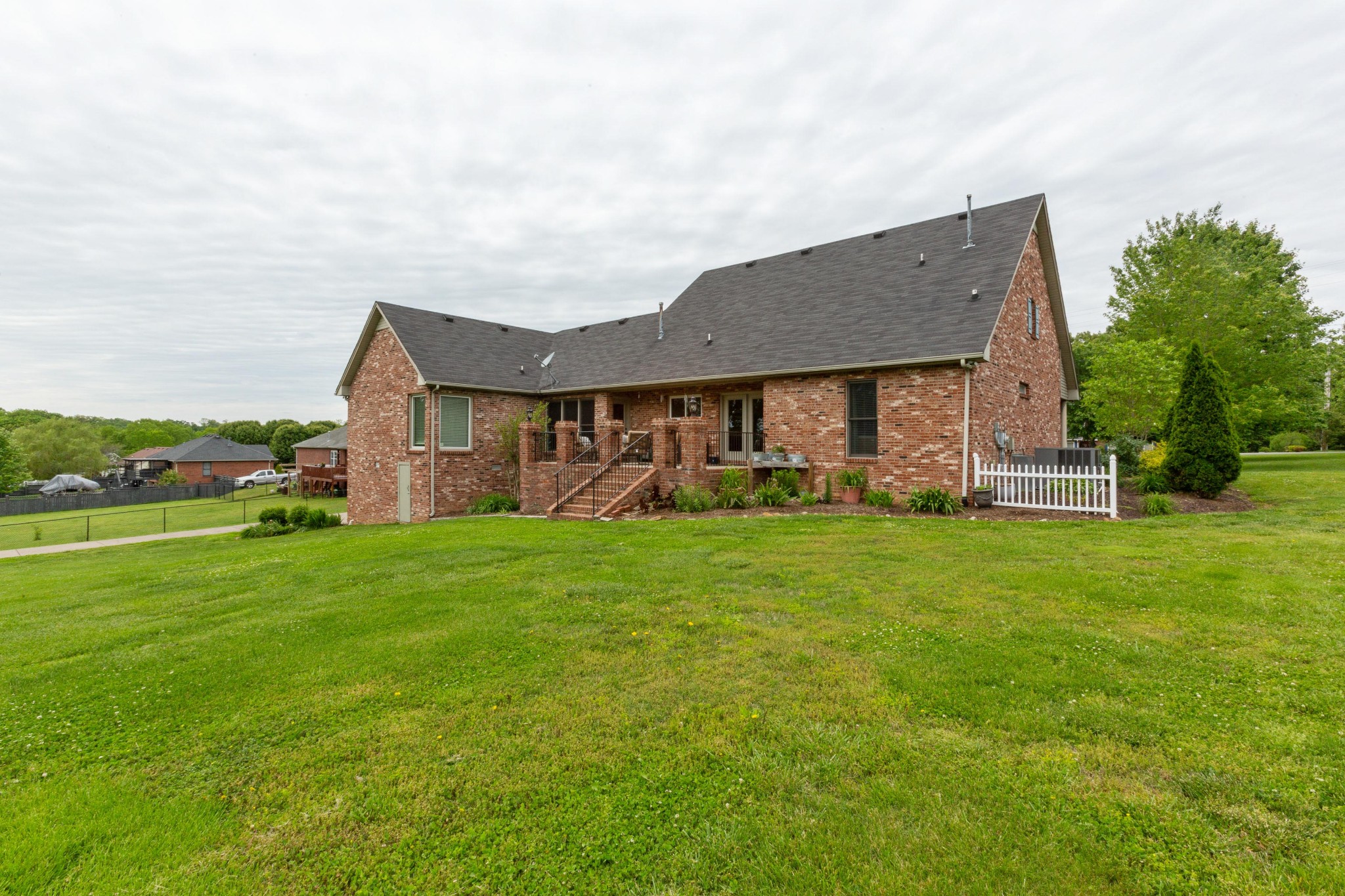 5059 Highpoint Road Pleasant View, TN 37146 - Photo 12 of 41 a front view of house with yard and green space