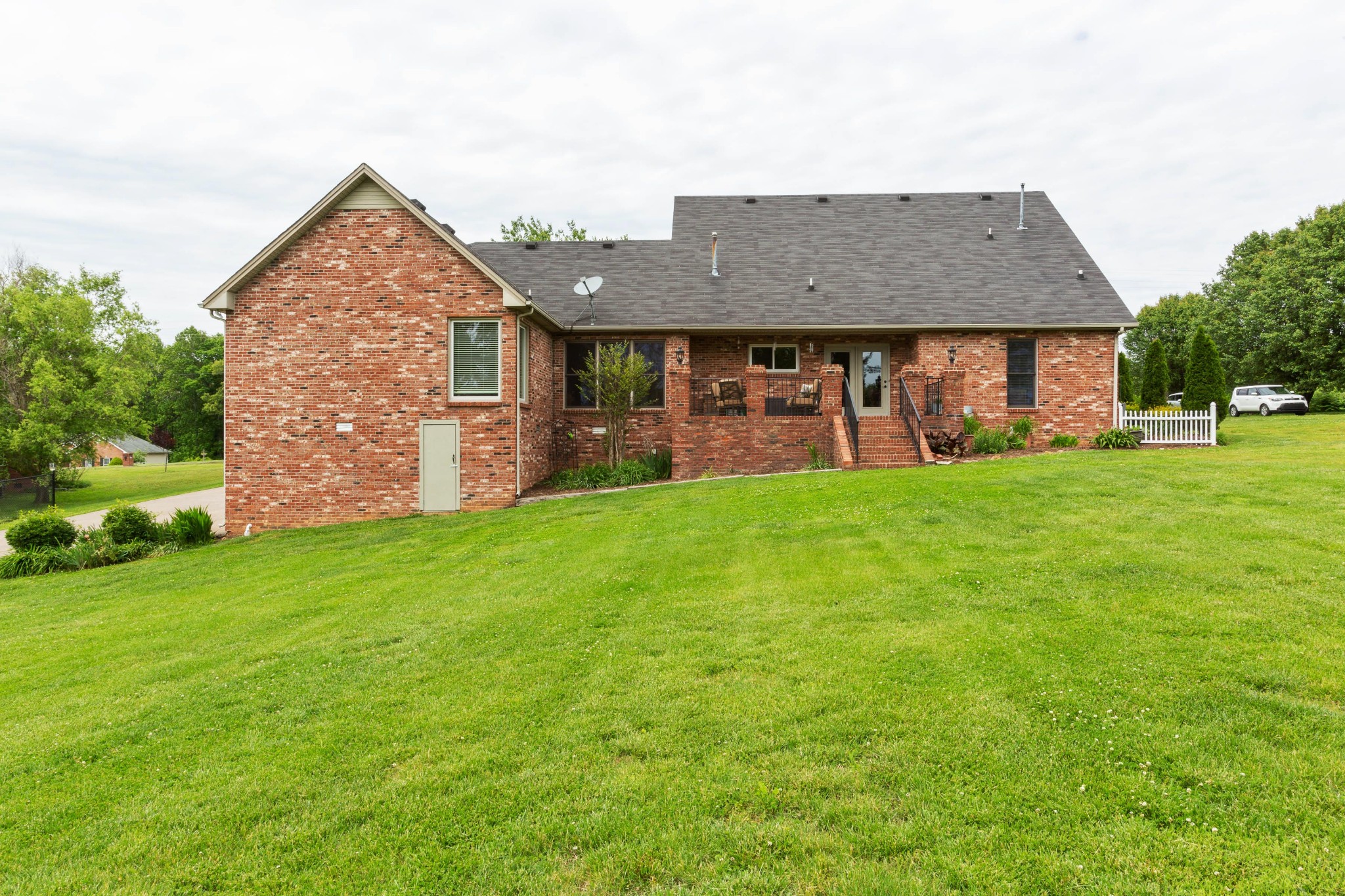 5059 Highpoint Road Pleasant View, TN 37146 - Photo 13 of 41 front view of a house with a yard