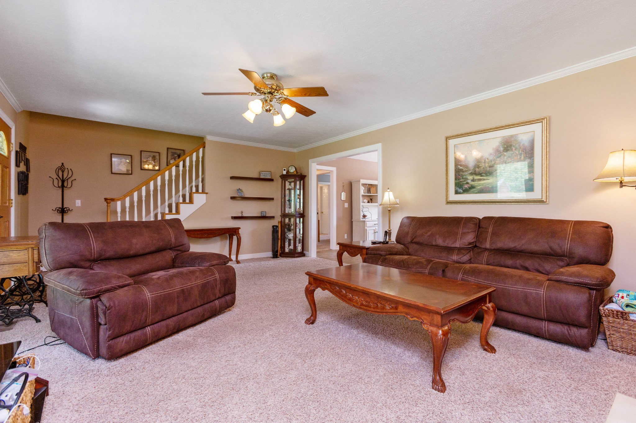 5059 Highpoint Road Pleasant View, TN 37146 - Photo 16 of 41 a living room with furniture and a ceiling fan