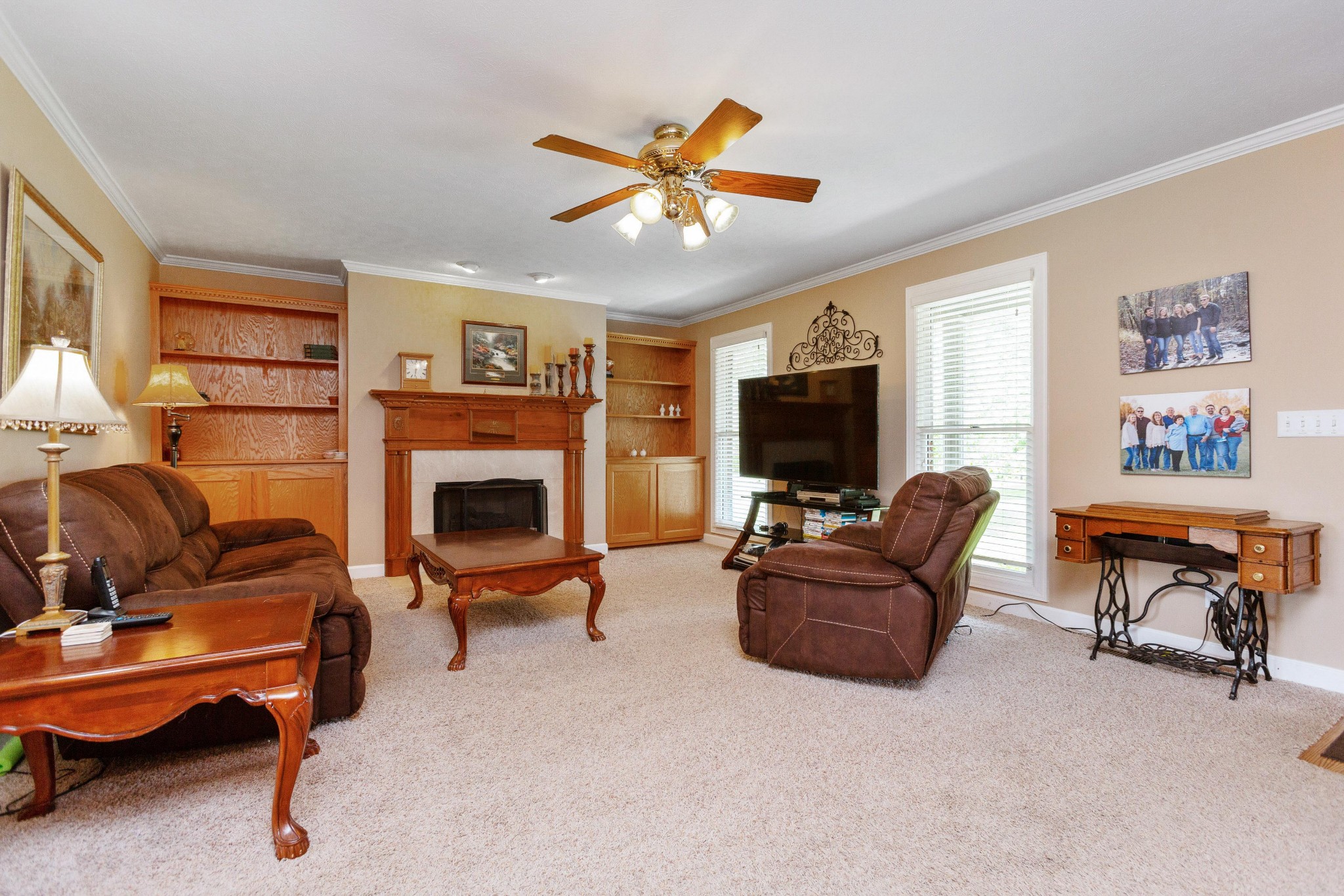 5059 Highpoint Road Pleasant View, TN 37146 - Photo 18 of 41 a living room with furniture and a flat screen tv with wooden floor