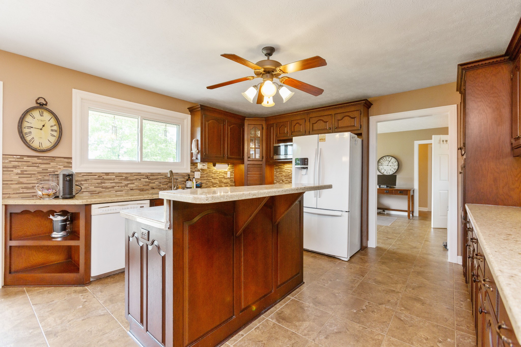 5059 Highpoint Road Pleasant View, TN 37146 - Photo 24 of 41 a kitchen with a refrigerator sink and cabinets