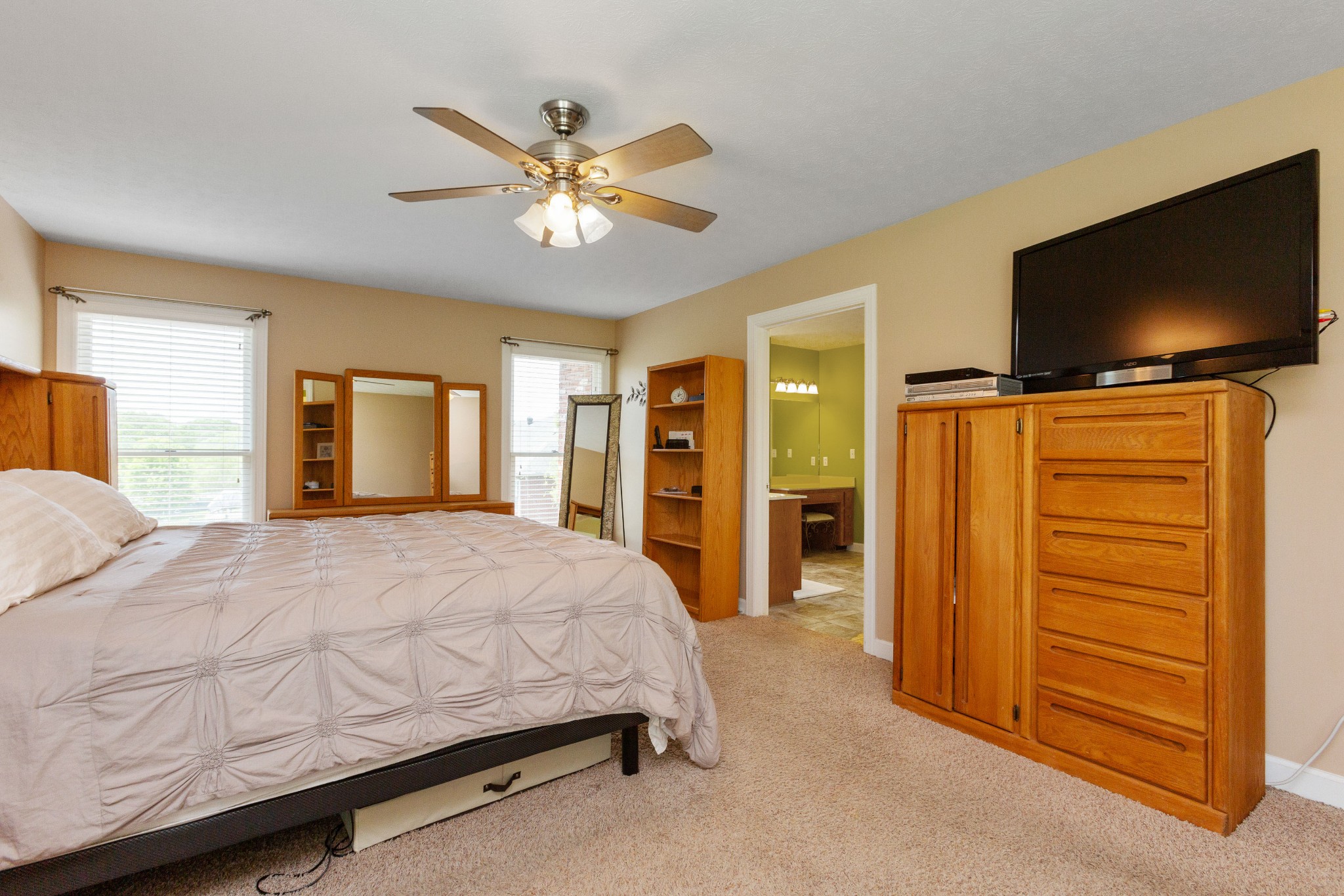 5059 Highpoint Road Pleasant View, TN 37146 - Photo 28 of 41 a bedroom with a bed and a flat screen tv