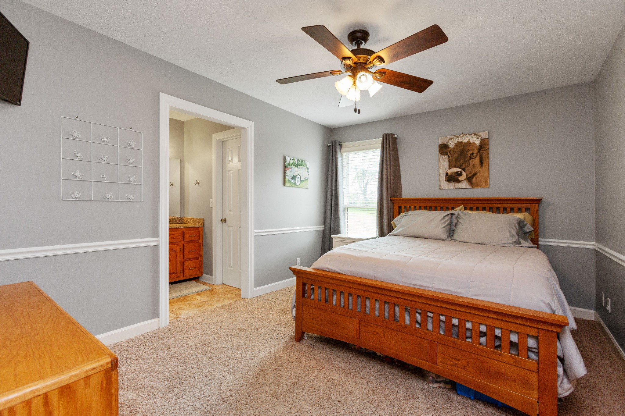 5059 Highpoint Road Pleasant View, TN 37146 - Photo 31 of 41 a bedroom with a bed and a ceiling fan