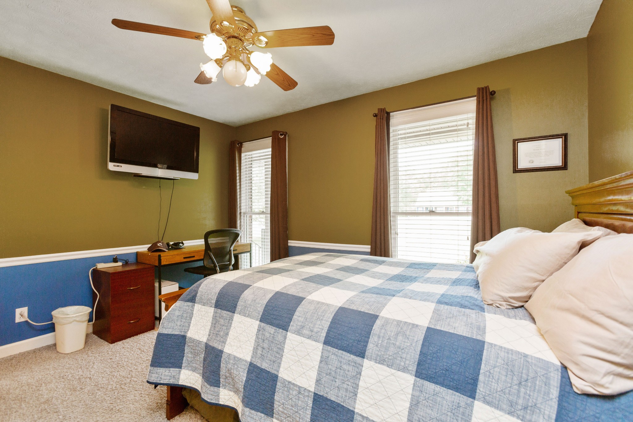 5059 Highpoint Road Pleasant View, TN 37146 - Photo 33 of 41 a bedroom with a bed and flat screen tv