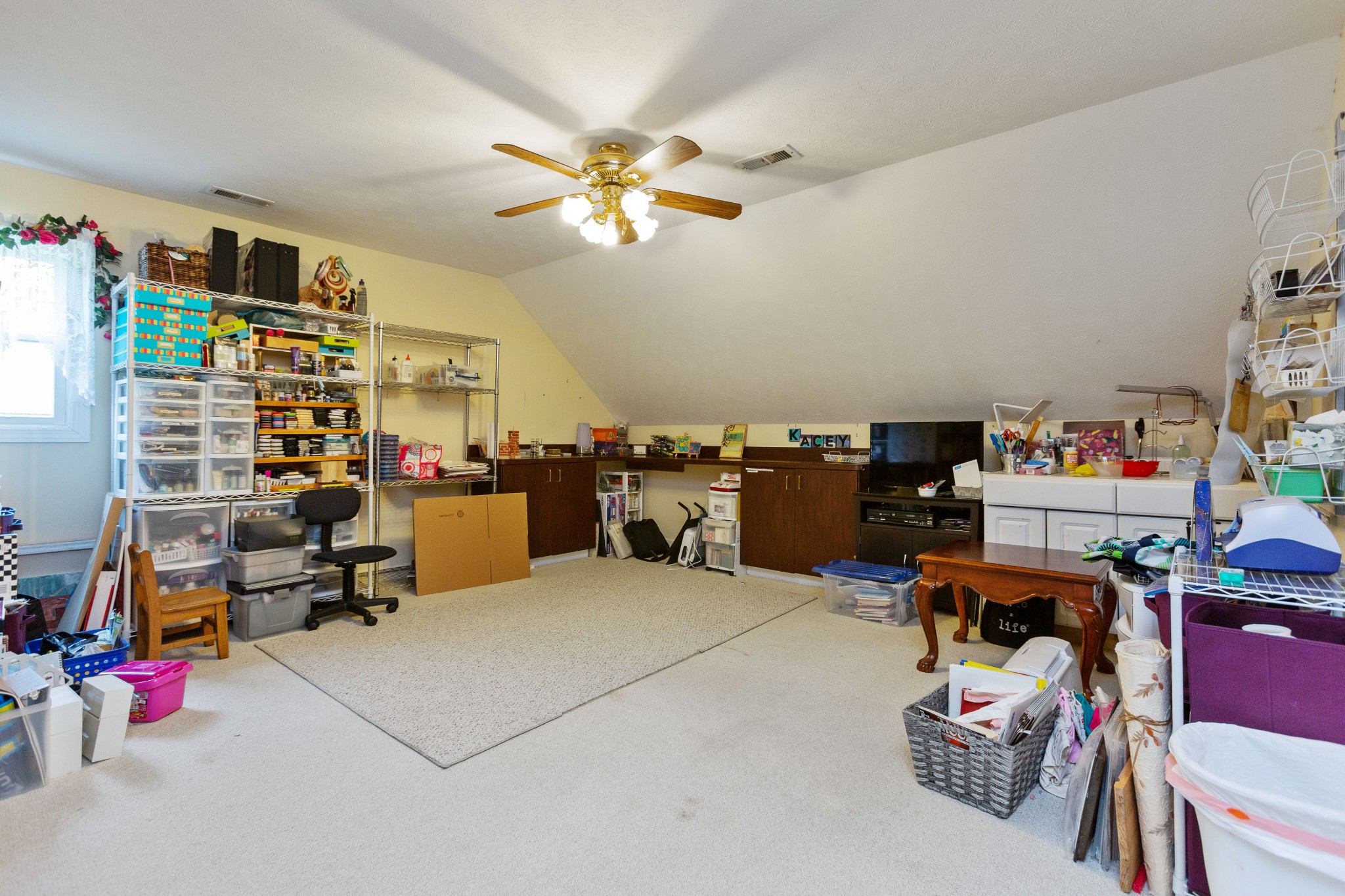 5059 Highpoint Road Pleasant View, TN 37146 - Photo 36 of 41 a bed room with a bed and a chandelier