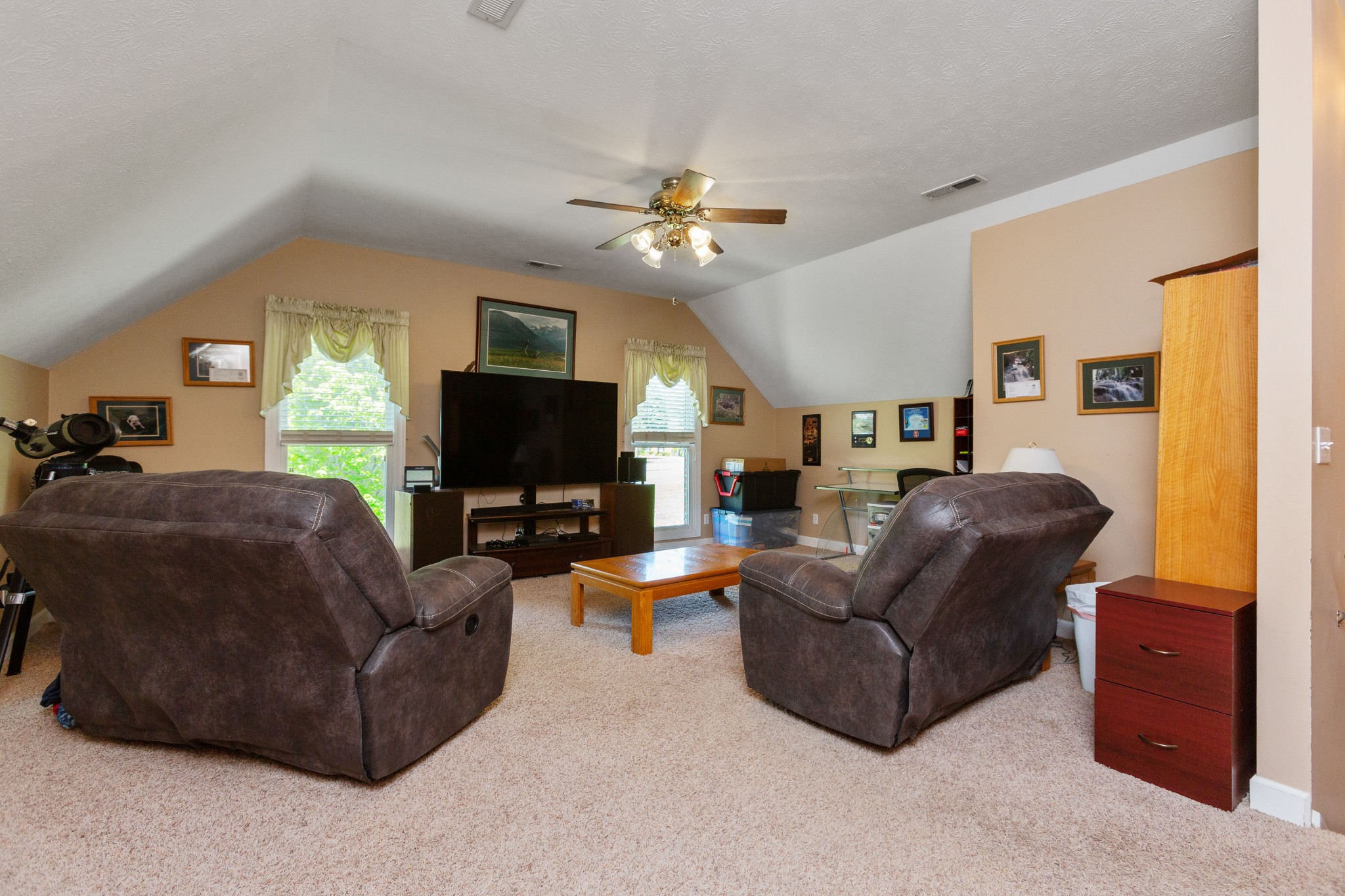 5059 Highpoint Road Pleasant View, TN 37146 - Photo 40 of 41 a living room with furniture and a flat screen tv