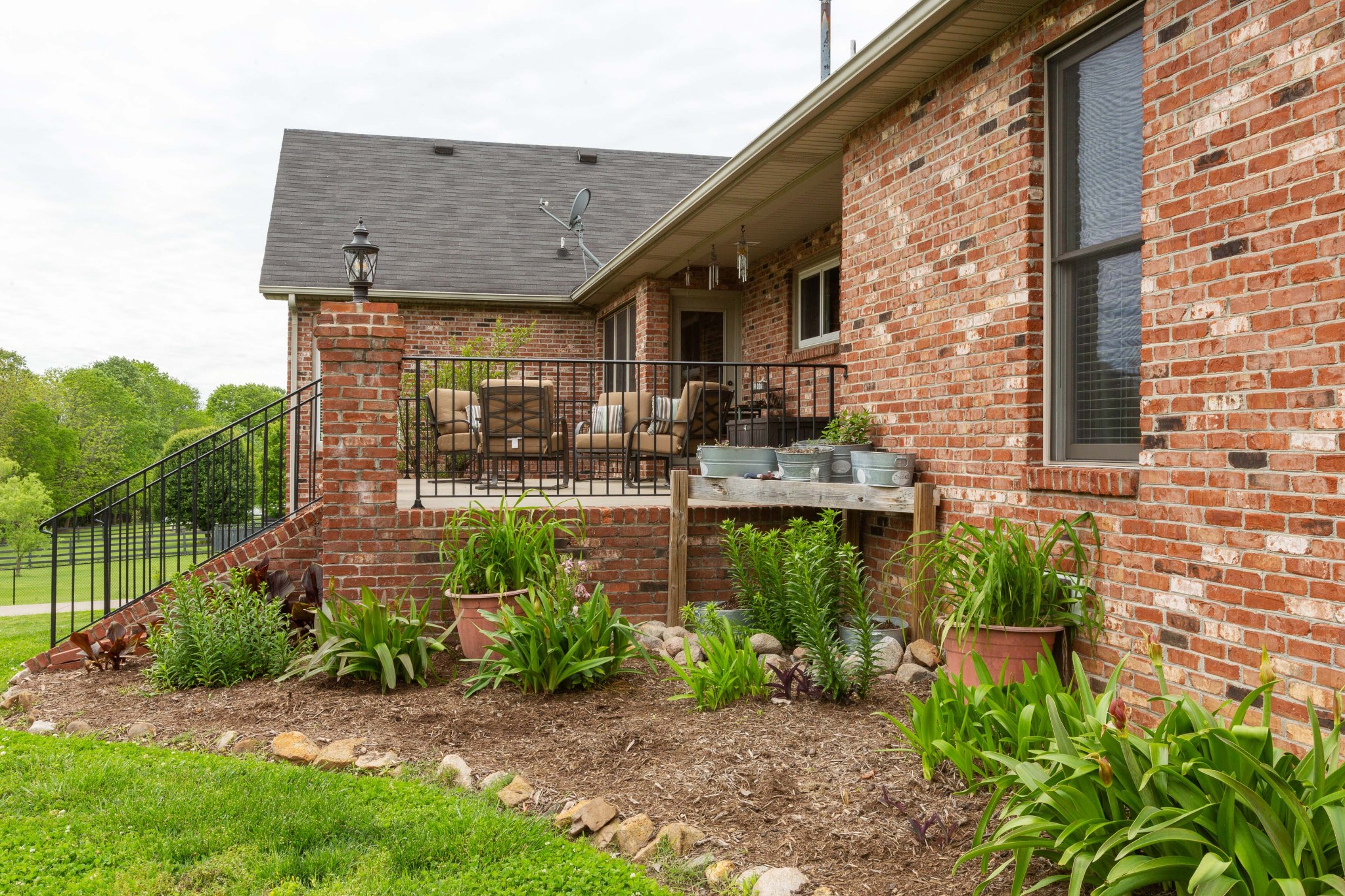 5059 Highpoint Road Pleasant View, TN 37146 - Photo 8 of 41 a front view of a house with garden
