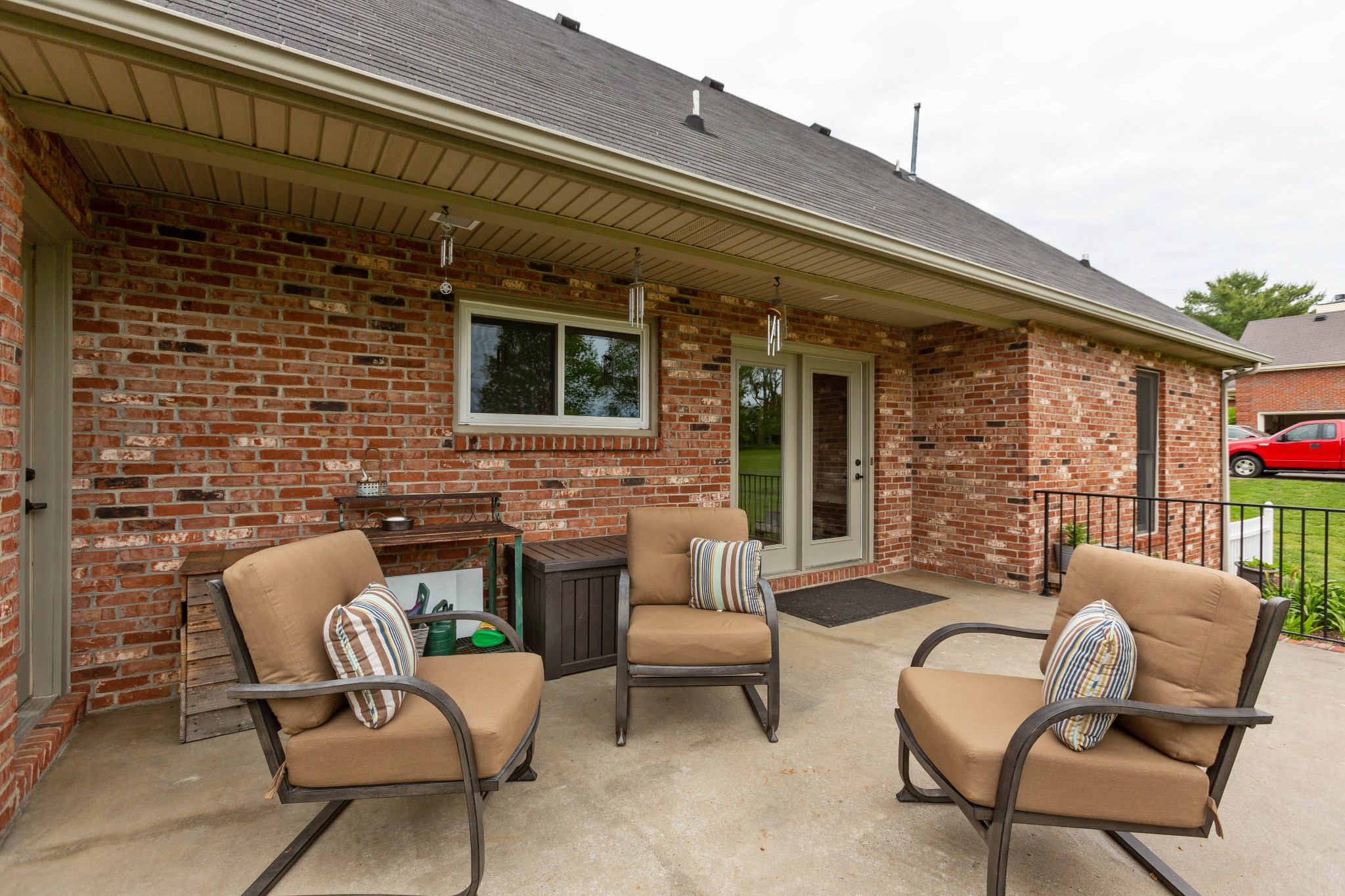 5059 Highpoint Road Pleasant View, TN 37146 - Photo 10 of 41 a patio with a table and chairs