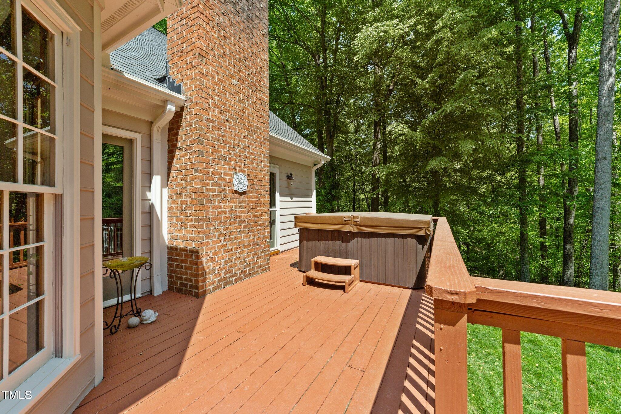 12200 Glenlivet Way Raleigh, NC 27613 - Photo 34 of 51 a balcony view with a backyard space