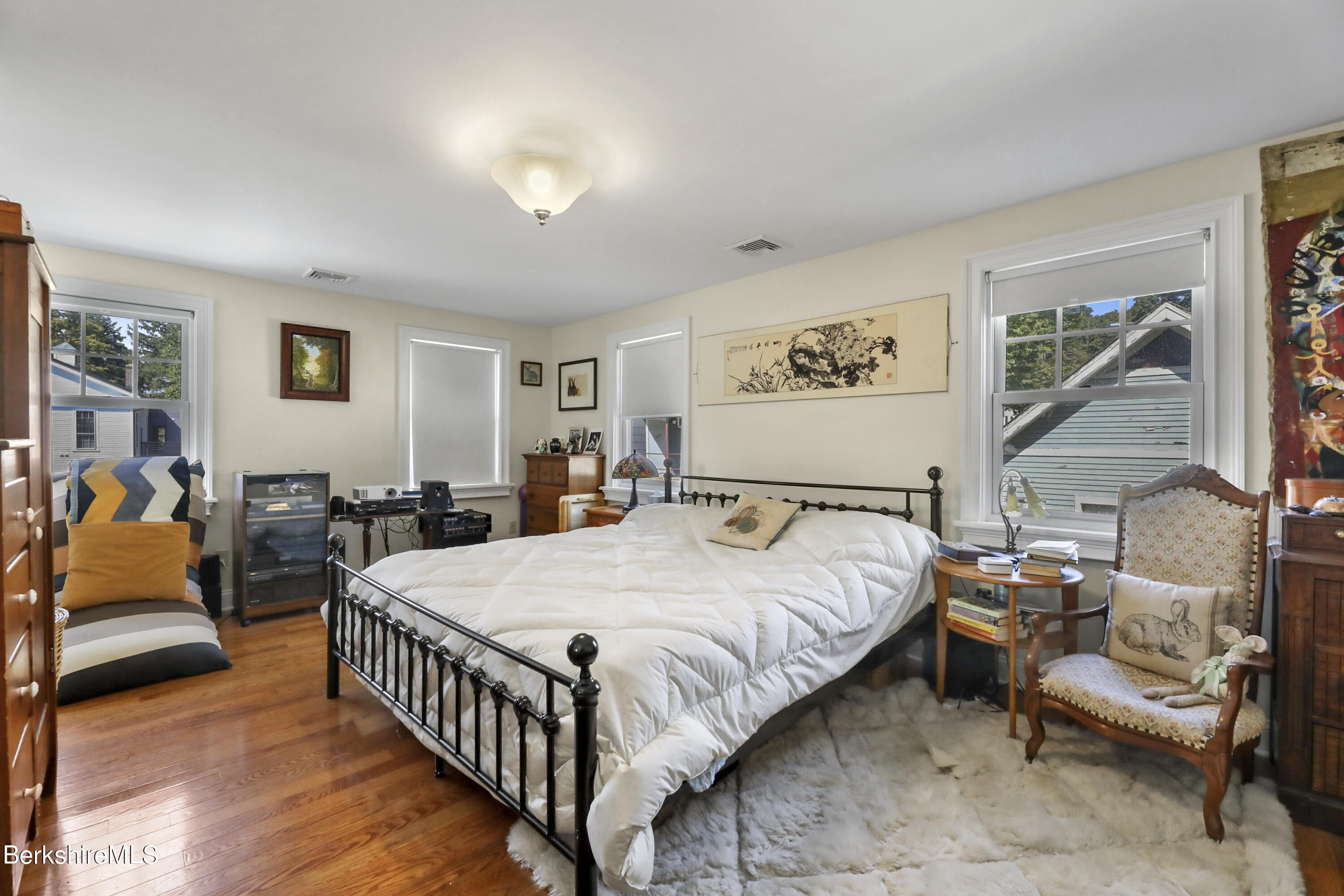 29 Main Street West Stockbridge, MA 01266 - Photo 27 of 51 a bed room with a bed and a chair