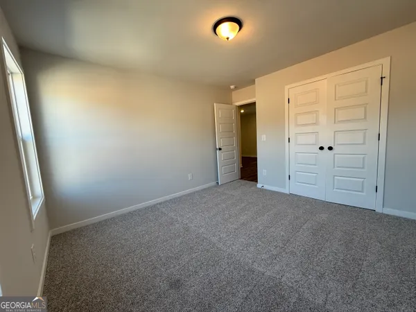 an empty room with closet