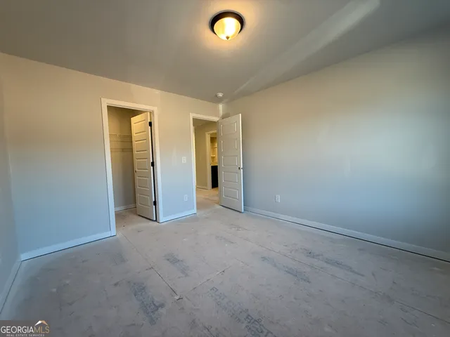 an empty room with windows