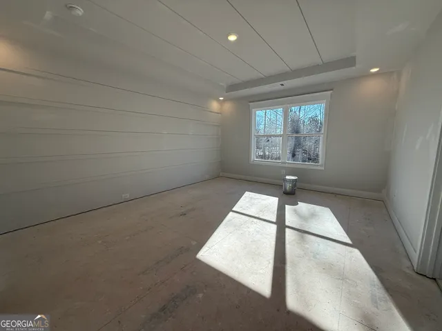 a view of an empty room and window